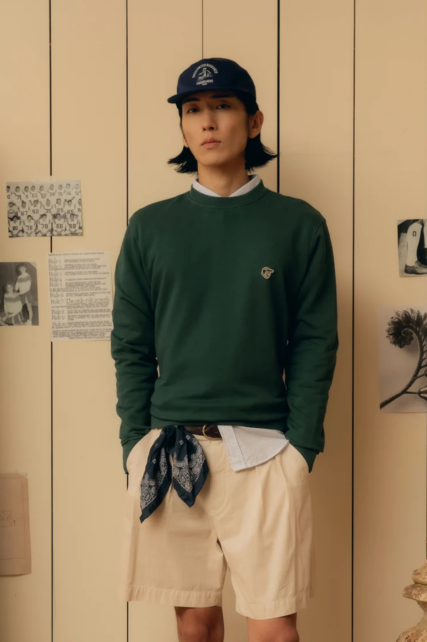 Model wearing the Pompeii Brand emilio crewneck in pine. Front view