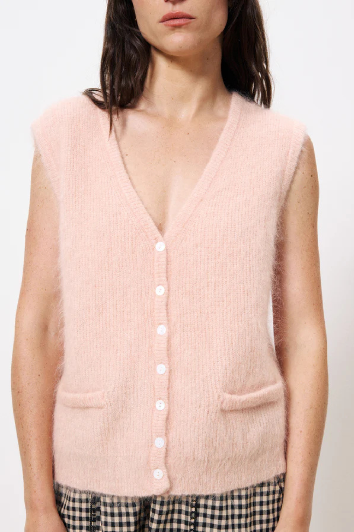 Model wearing the FRNCH meliza cardigan in rose pale. Front view