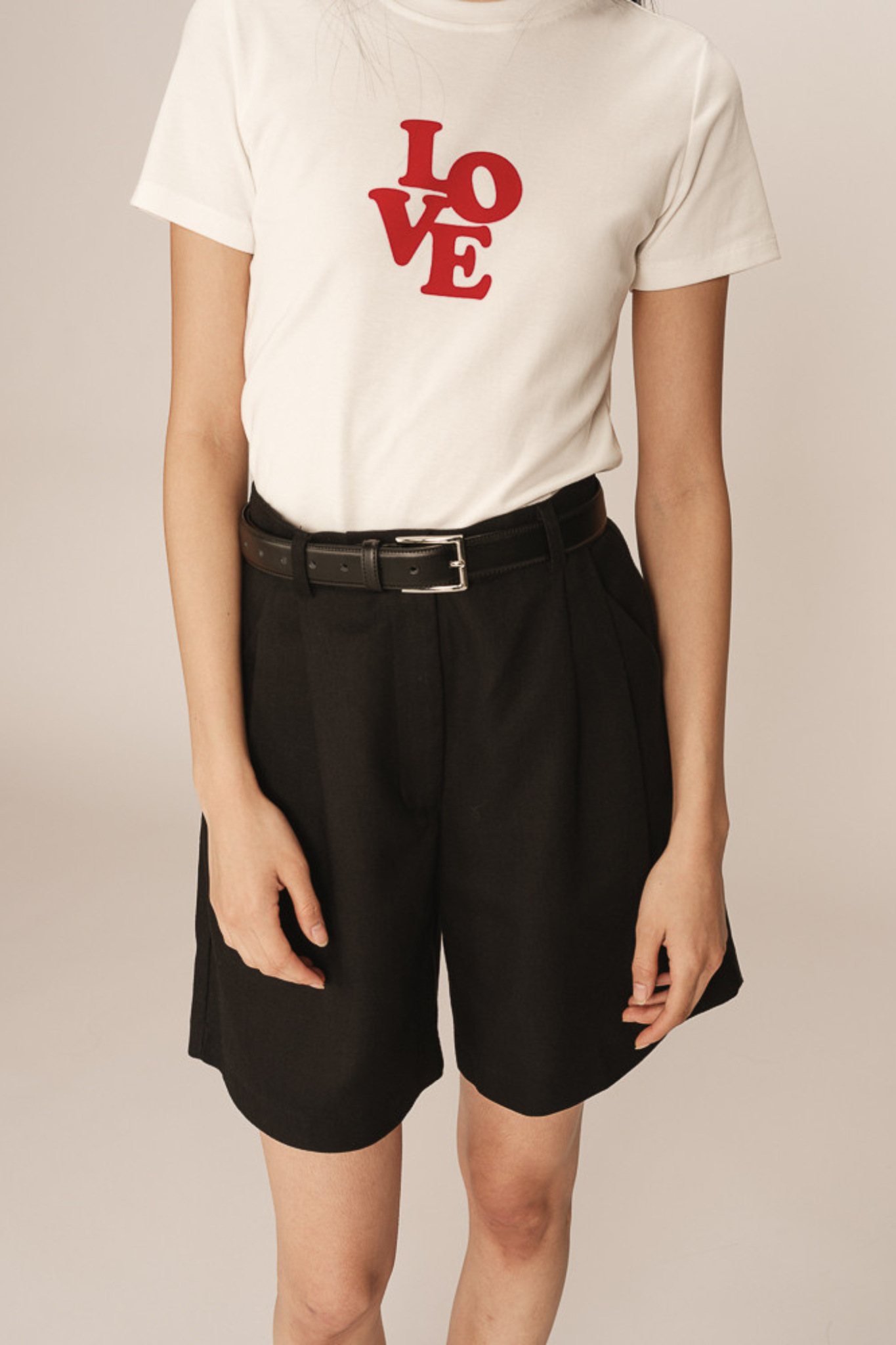 Model wearing the Grace & Mila pastel bermuda short in black. Front view