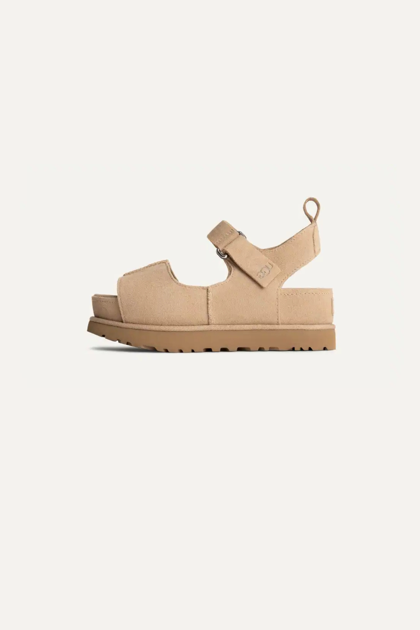 UGG women goldenstar hi in sand. Side view