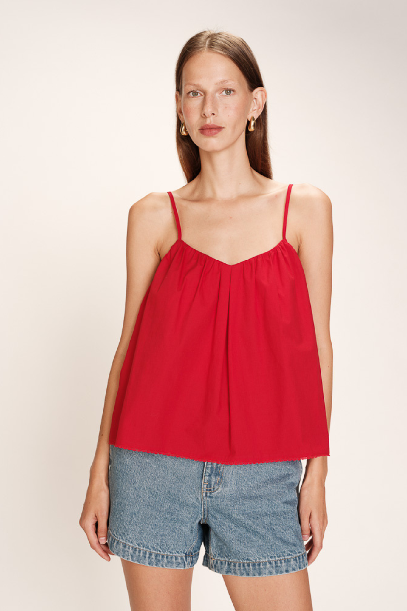 Model wearing the Grace & Mila real top in rouge. Front view