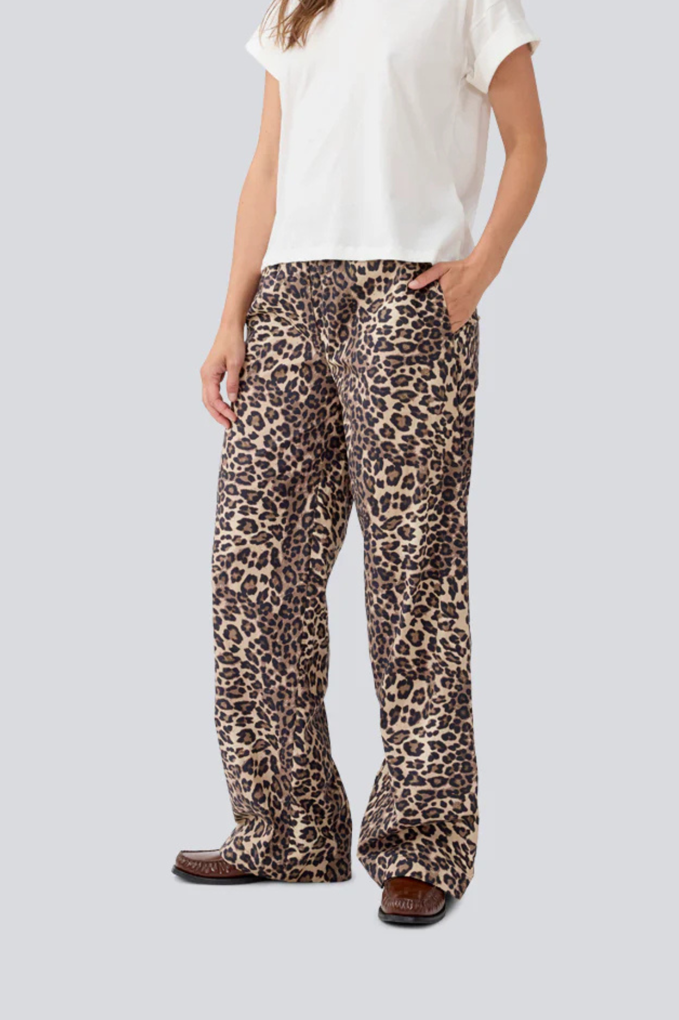 Model wearing the Modstrom mood print pants in leo. Front view