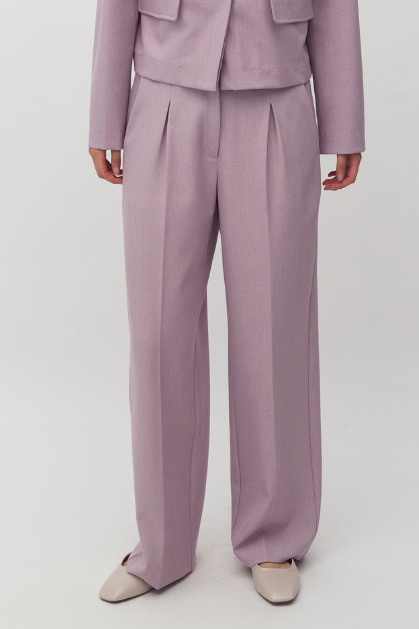 Model wearing the MBYM cristiana morenna pants in orchid bloom. Front view