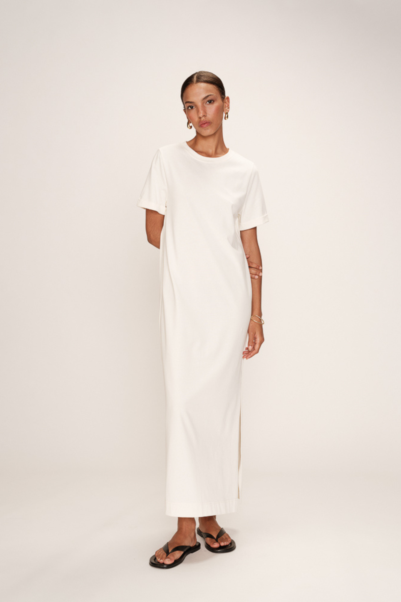 Model wearing the Grace & Mila rosalie dress in ecru. Front view
