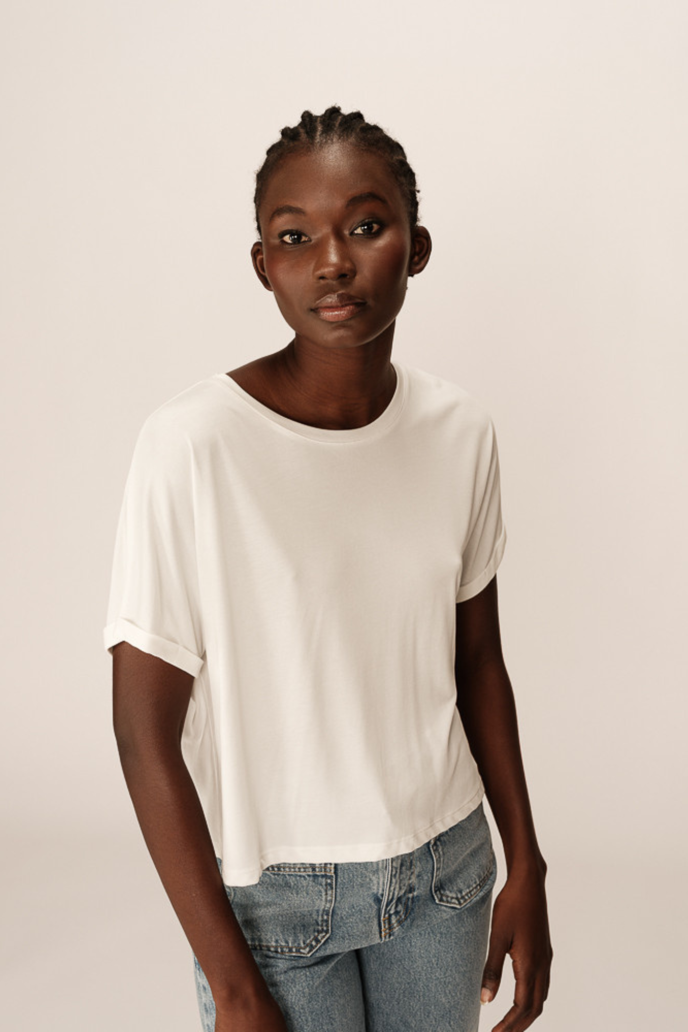 Model wearing the Grace & Mila parma t-shirt in ecru. Front view