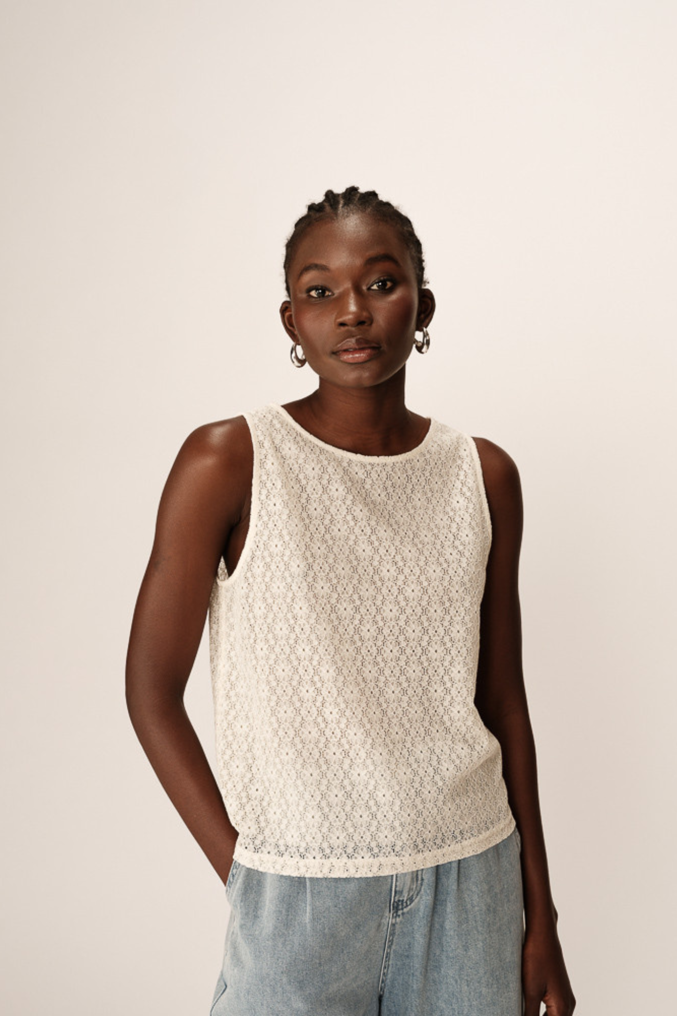 Model wearing the Grace & Mila passionnee top in ecru. Front view