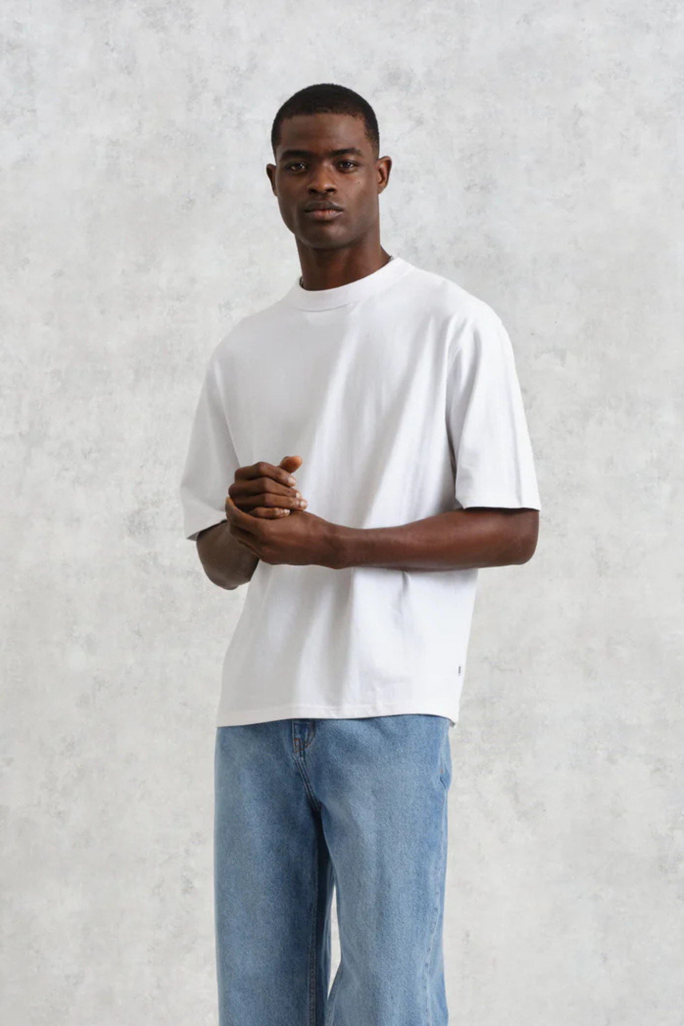 Model wearing the Wax London milton t-shirt in white. Front view