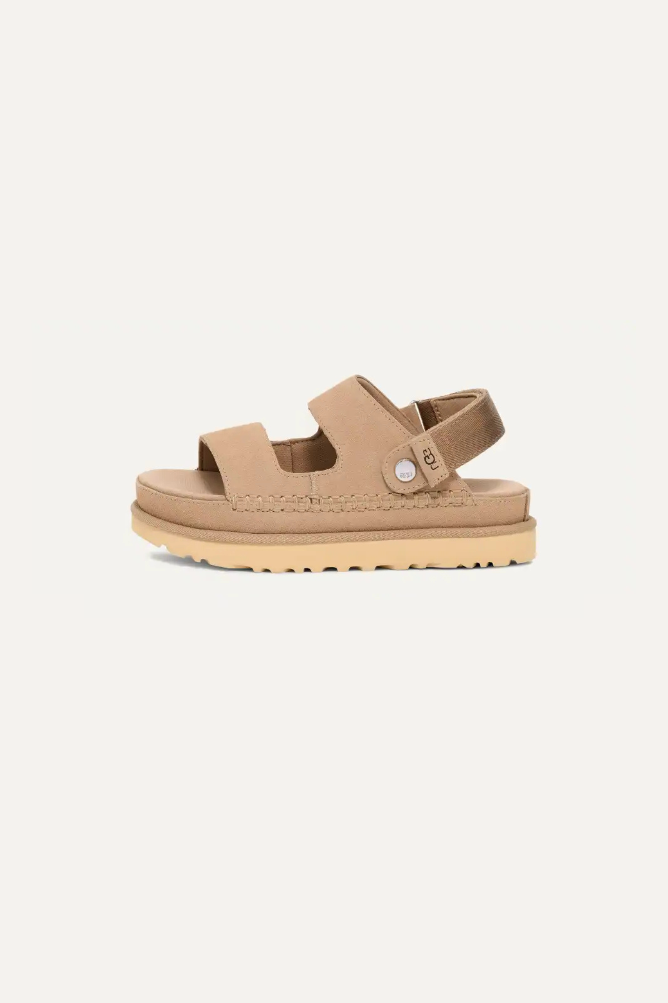 UGG women goldenstar glide in sand. Side view