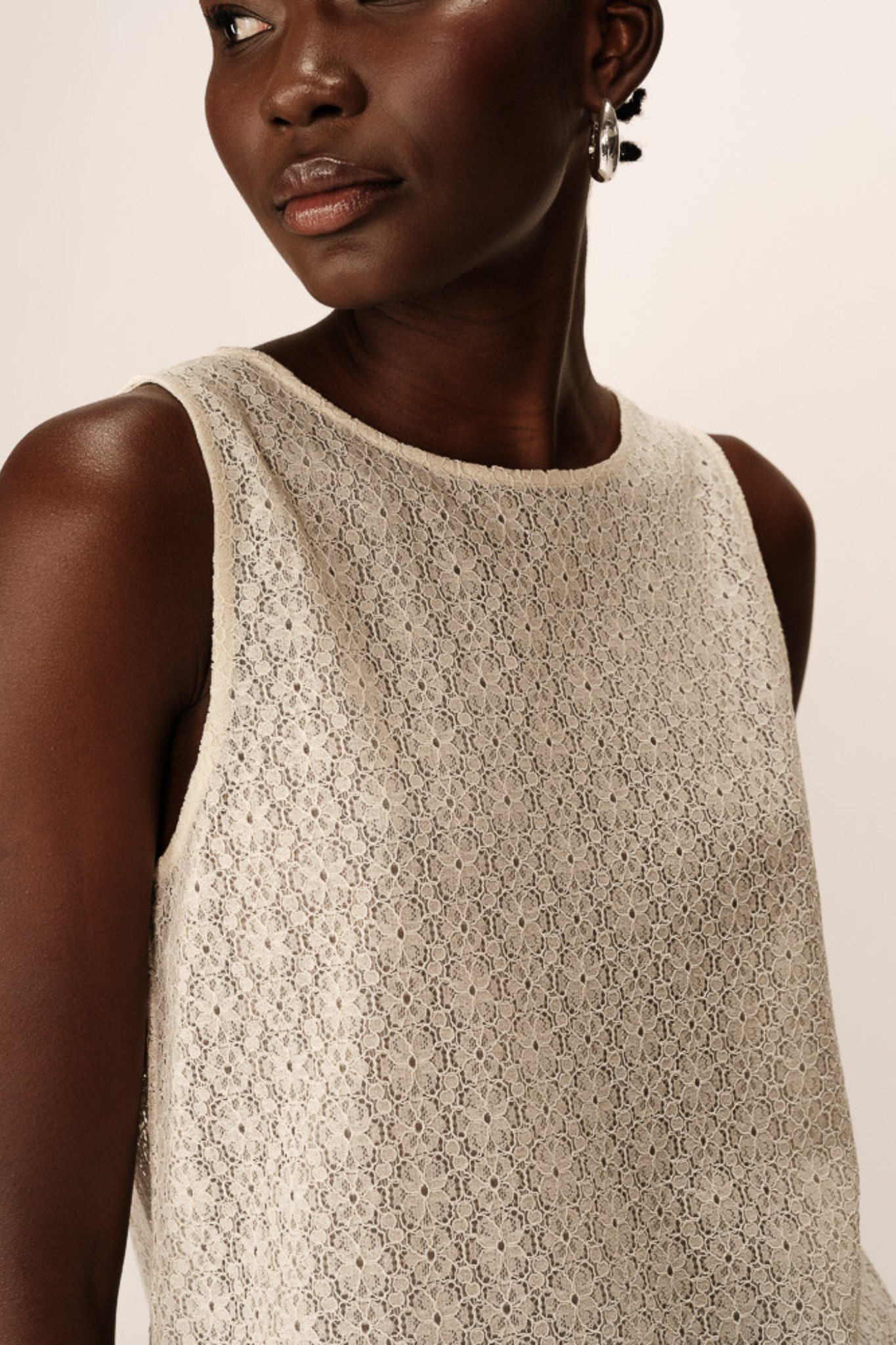 Model wearing the Grace & Mila passionnee top in ecru. Close front view
