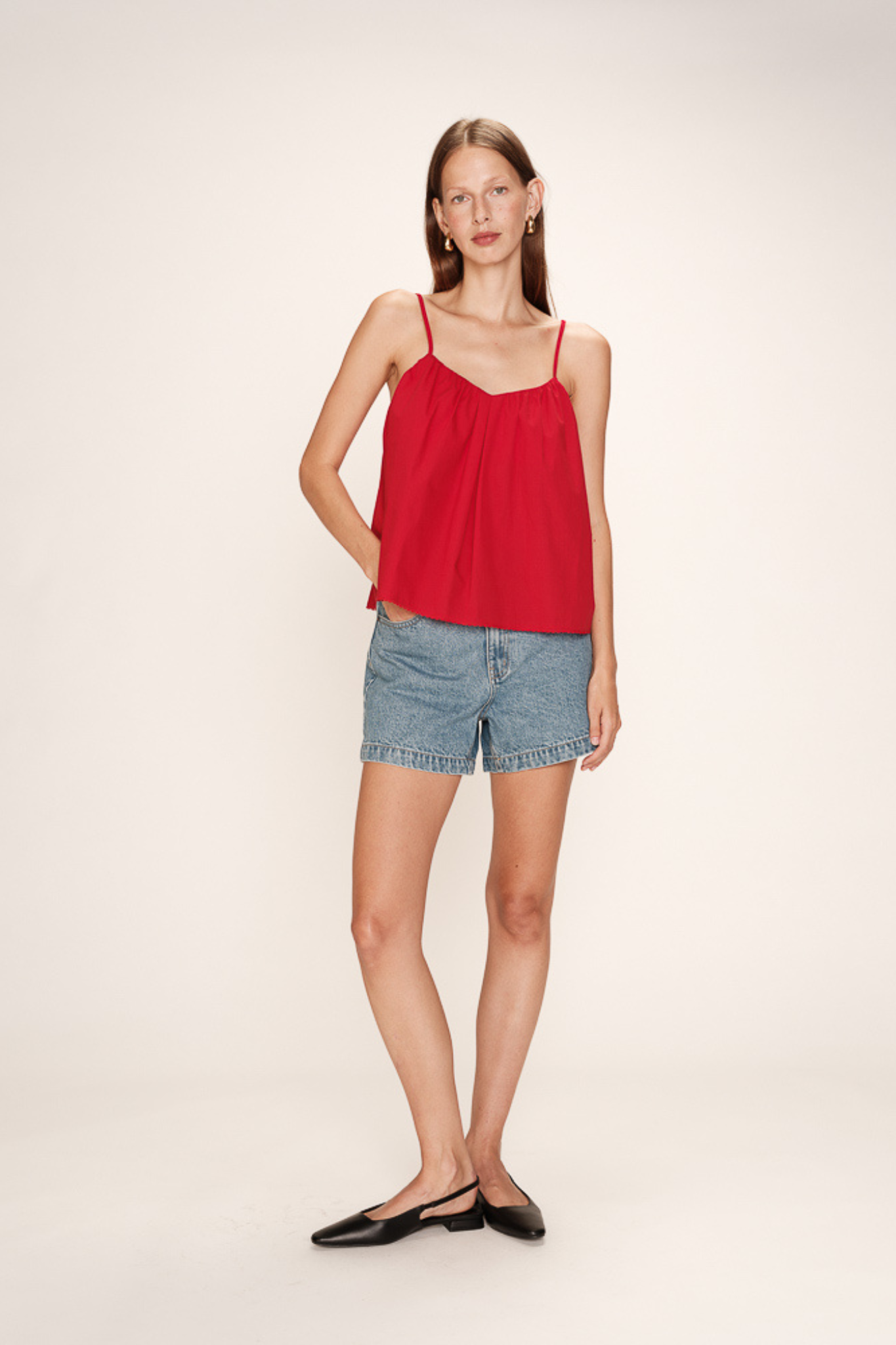 Model wearing the Grace & Mila real top in rouge. Front view