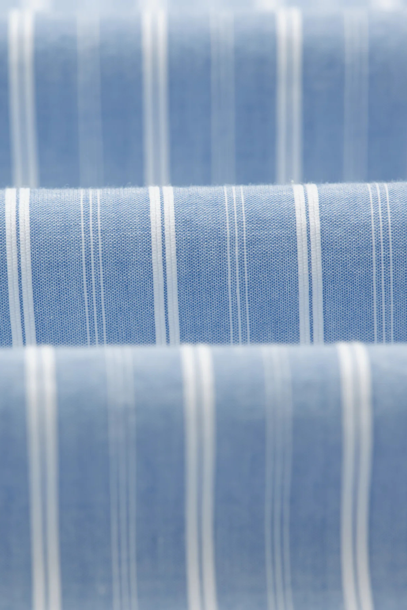 Wax London rove poplin stripe shirt in blue. Close fabric view