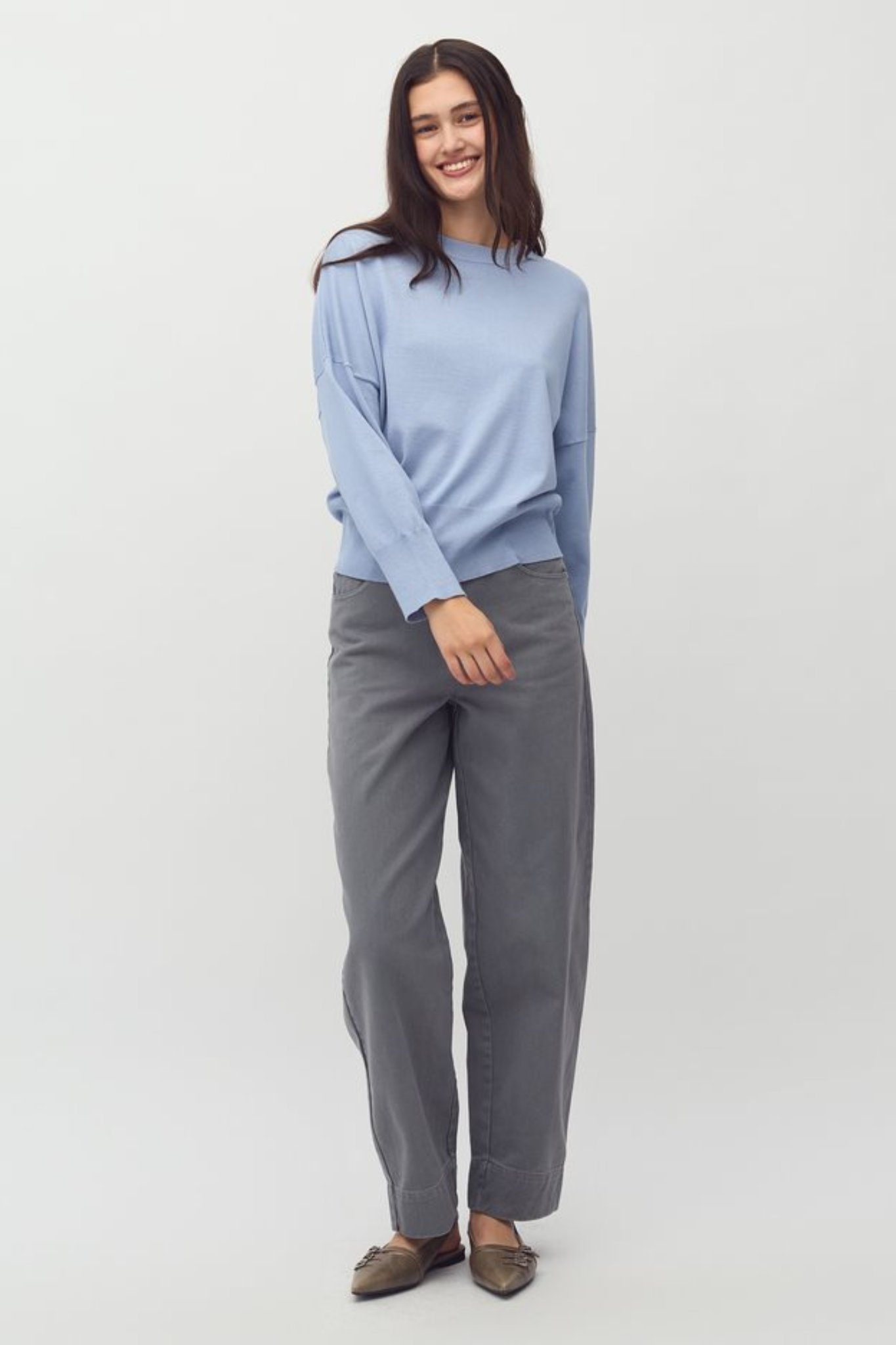 Model wearing the MBYM bravani gillian knit in steel blue. Front view