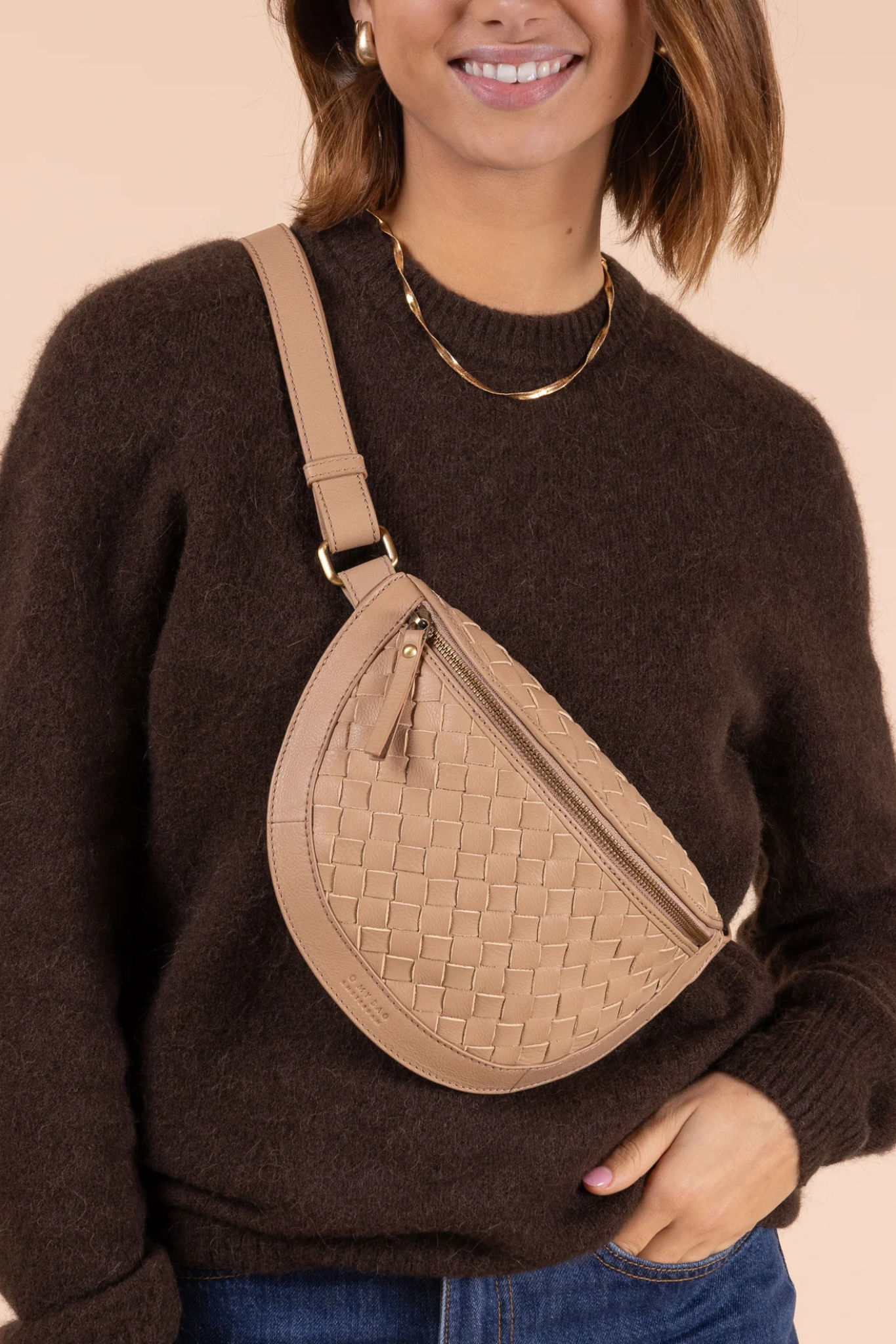 O MY BAG ray rumbag in sand woven soft grain leather. Front view