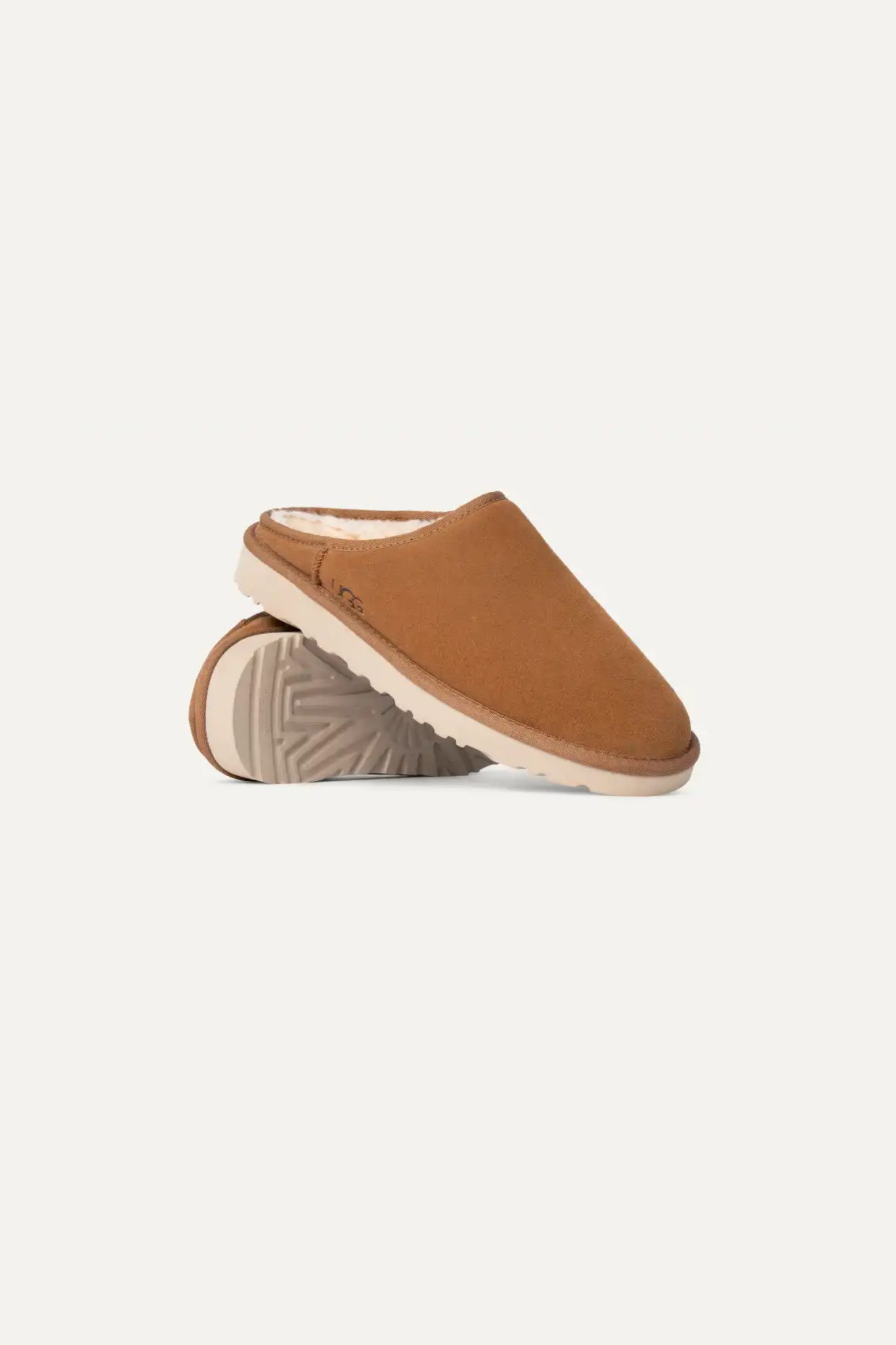 UGG man classic slip-on in chestnut. Side view
