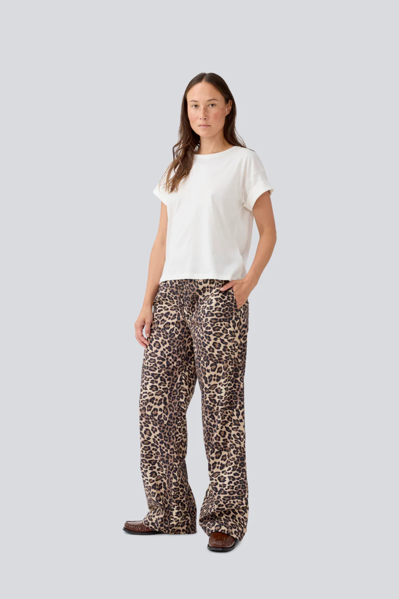 Model wearing the Modstrom mood print pants in leo. Front view