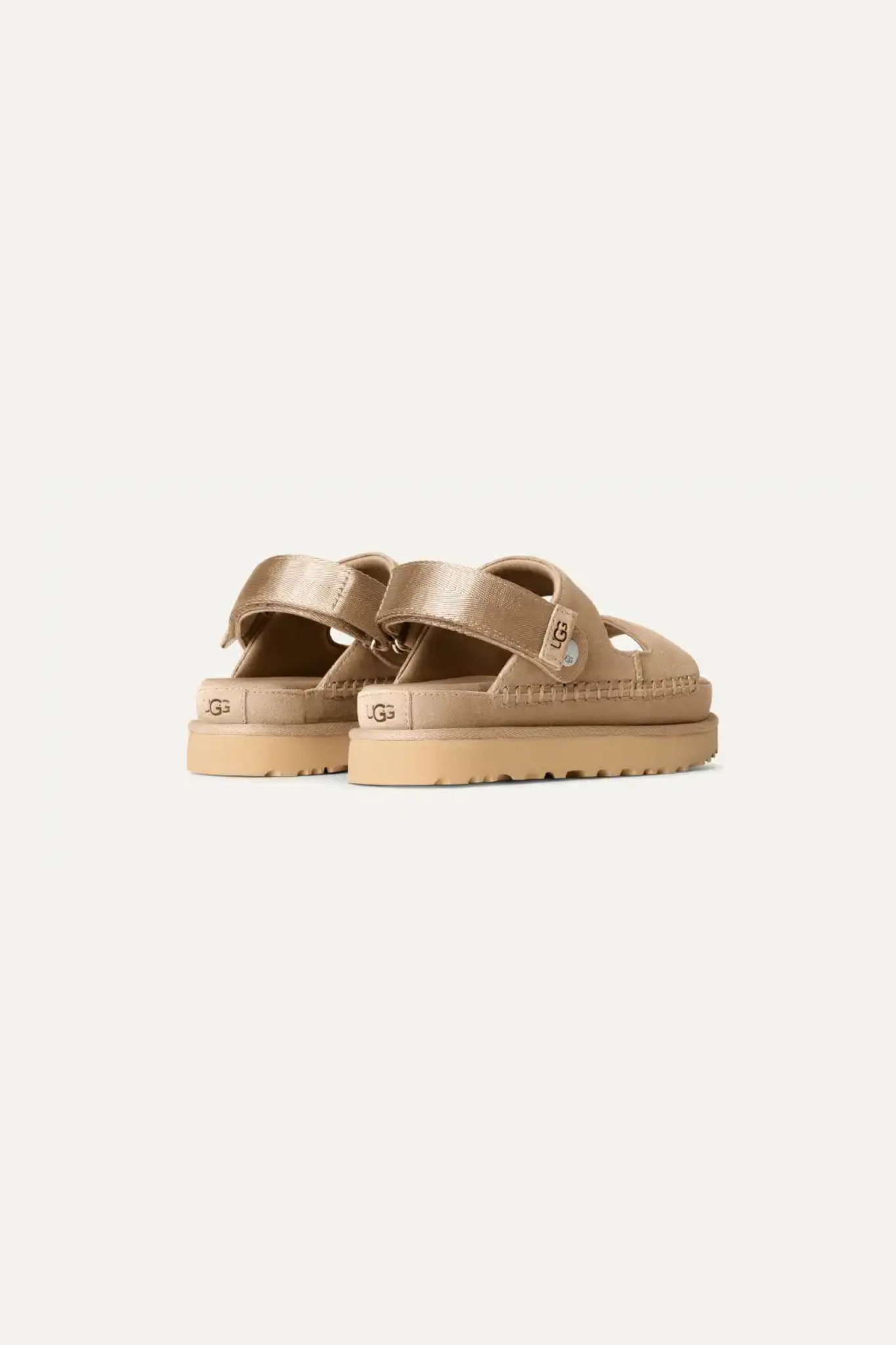 UGG women goldenstar glide in sand. Back view