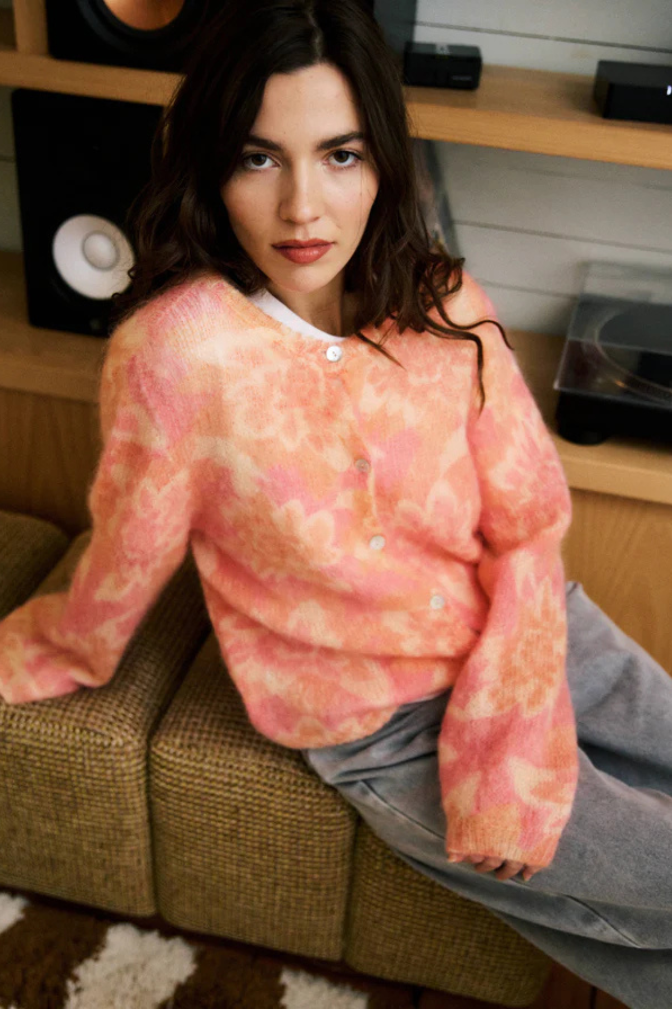 Model wearing the FRNCH calixta cardigan in multi/flowers. Front view