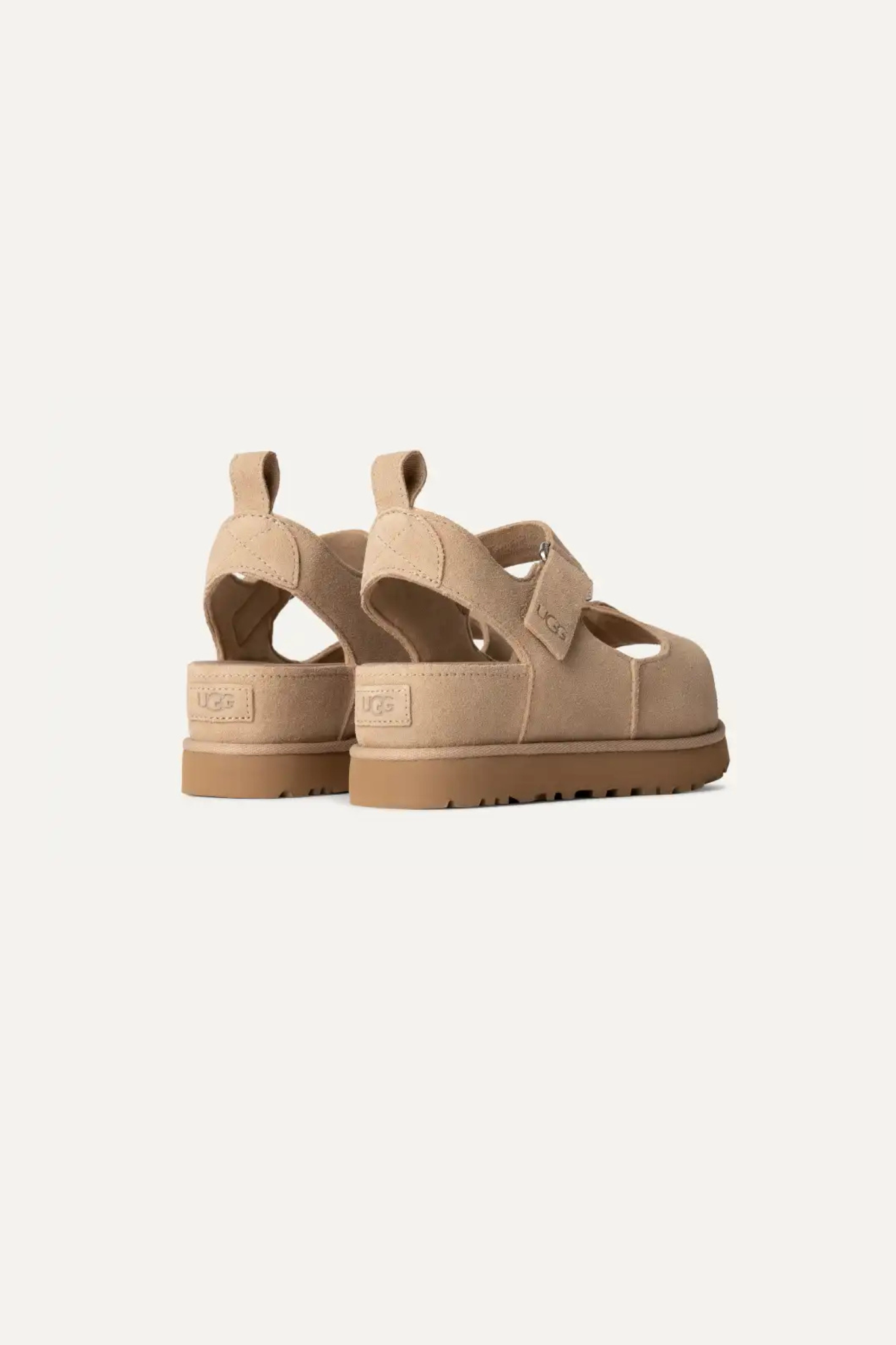 UGG women goldenstar hi in sand. Back view