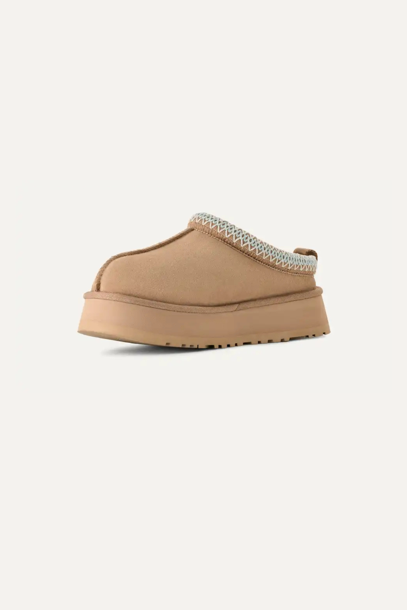 UGG women tazz in sand. Front view