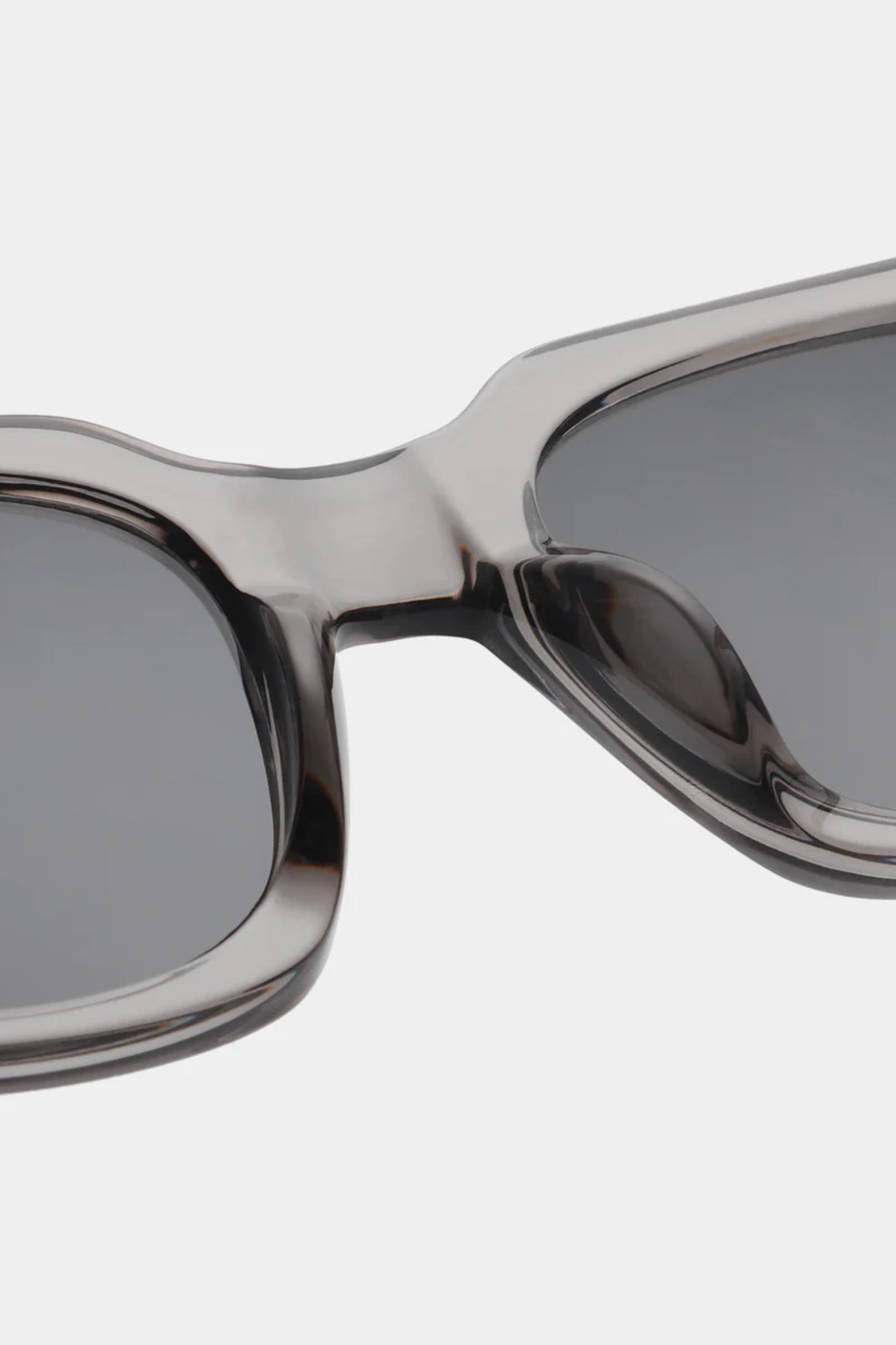 A. Kjaerbede nancy sunglasses in grey transparent. Close front view