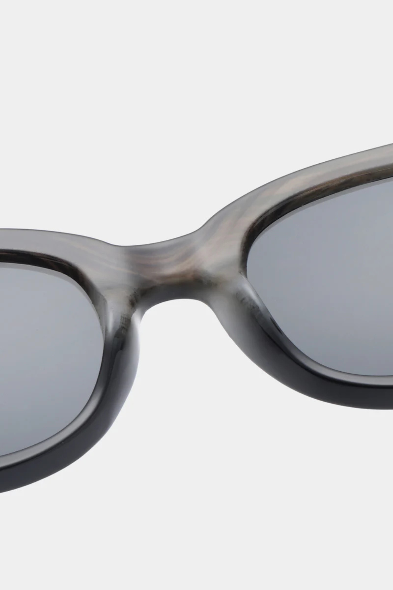 A. Kjaerbede lilly sunglasses in striped horn/black. Close front view