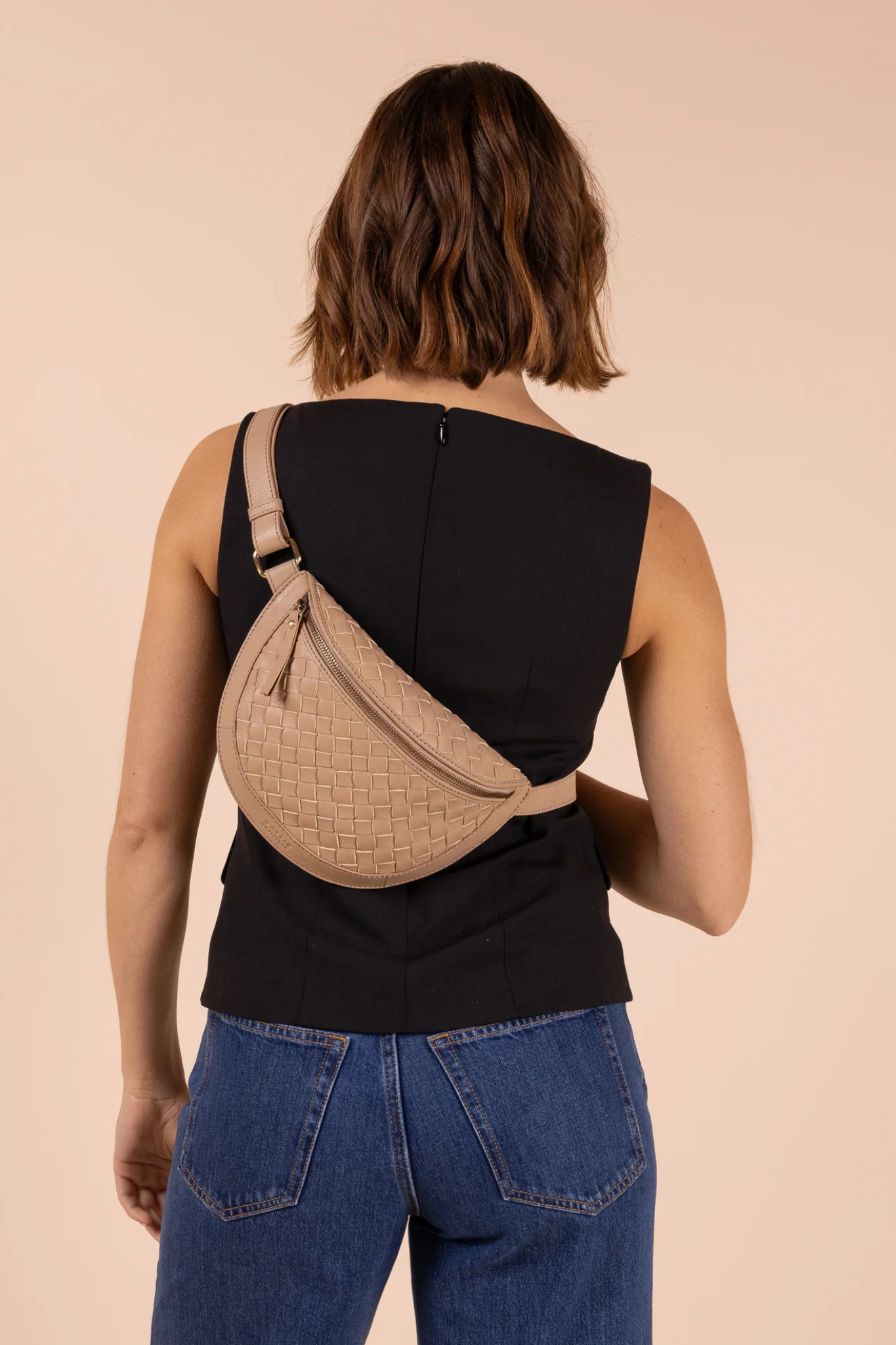 O MY BAG ray rumbag in sand woven soft grain leather. Front view