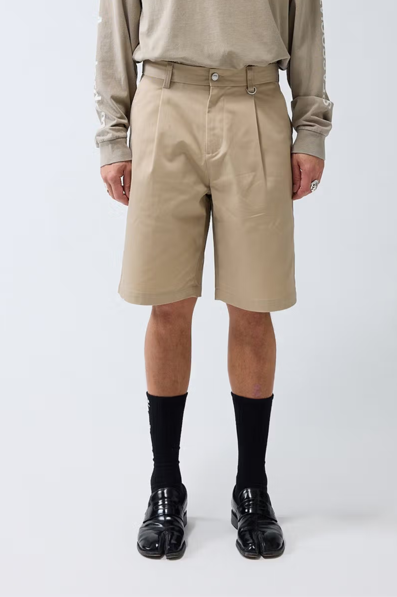 Model wearing the New Amsterdam reworked short in camel. Front view