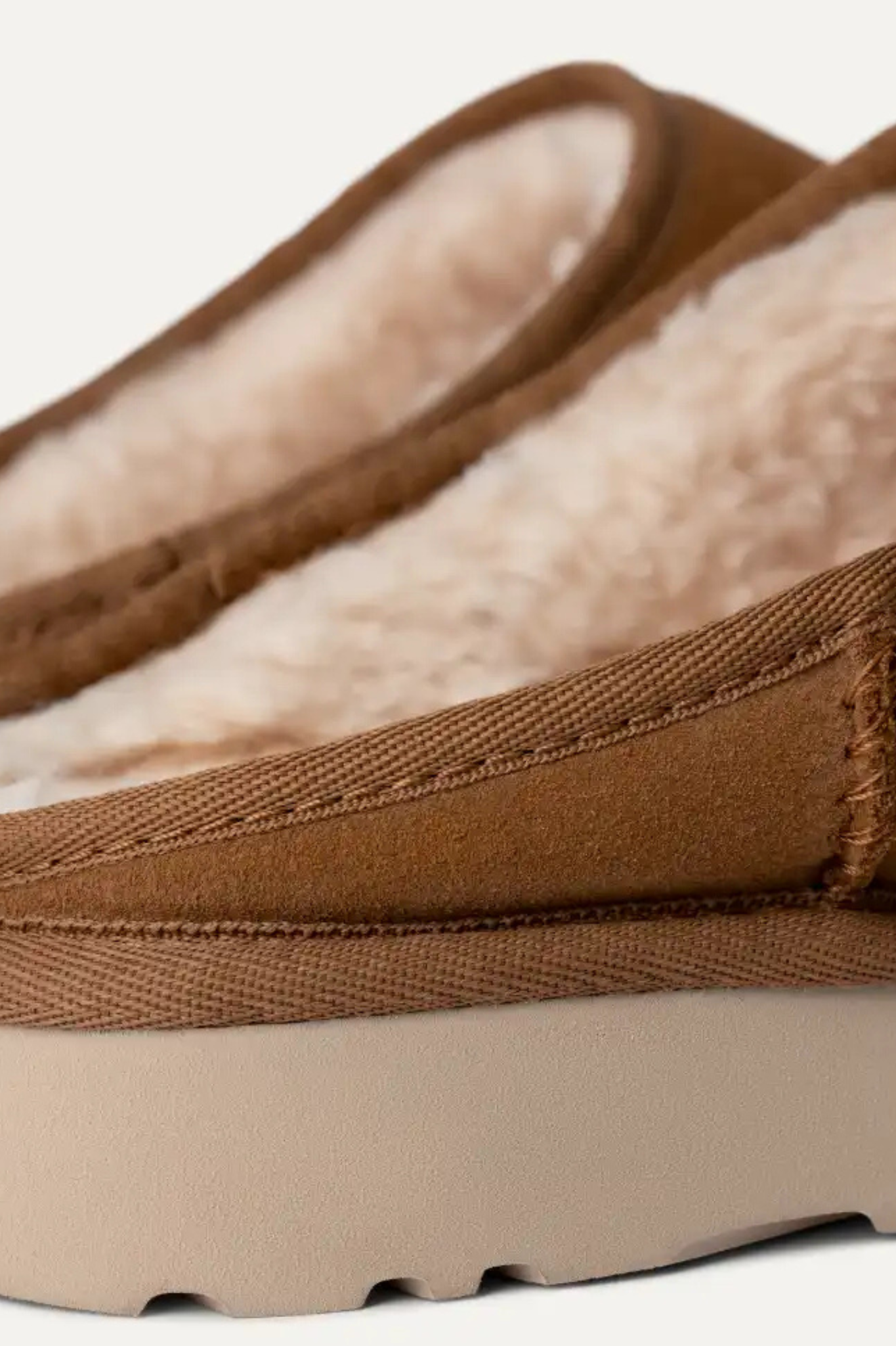 UGG man classic slip-on in chestnut. Close back view