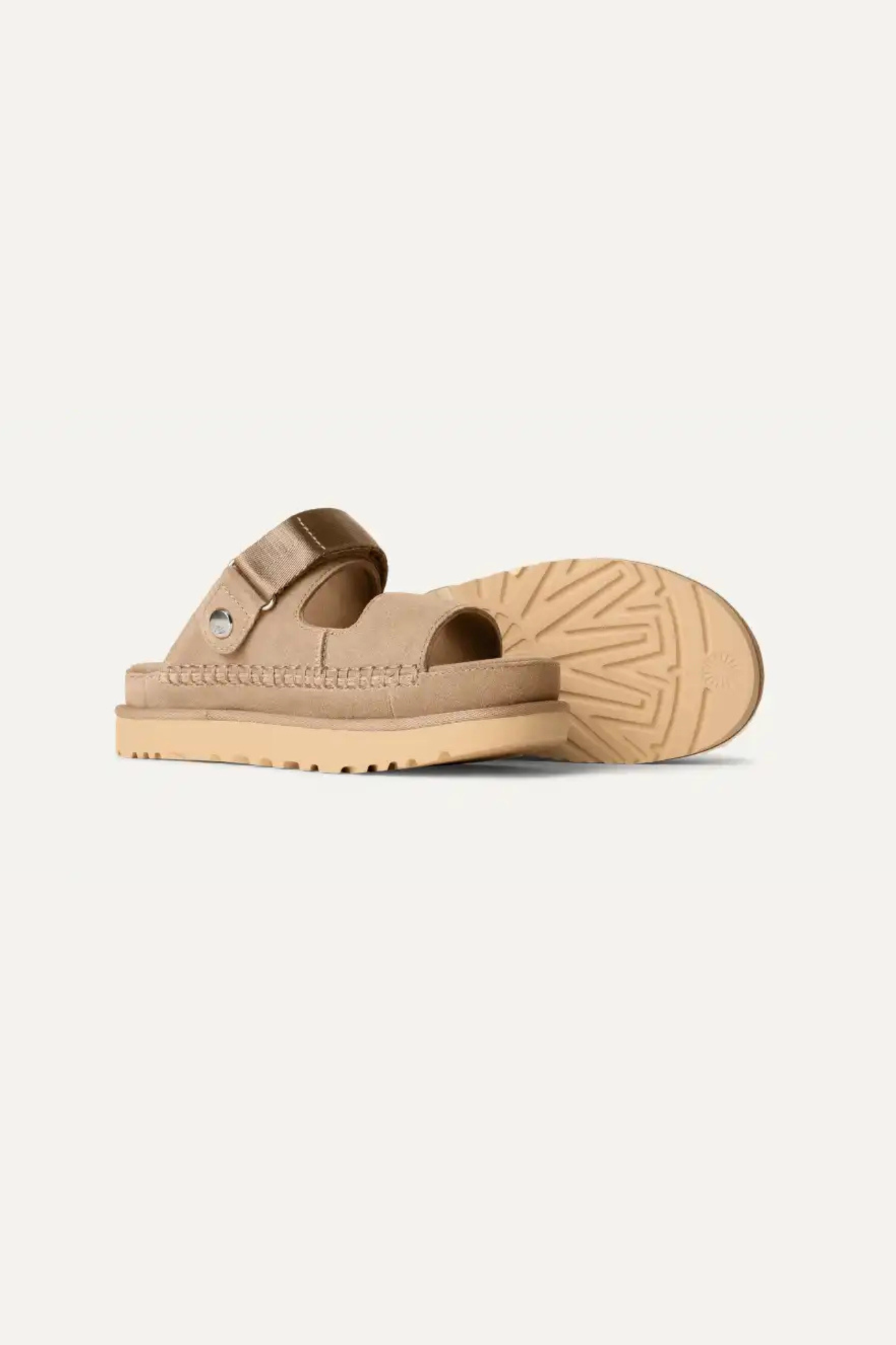UGG women goldenstar glide in sand. Side view