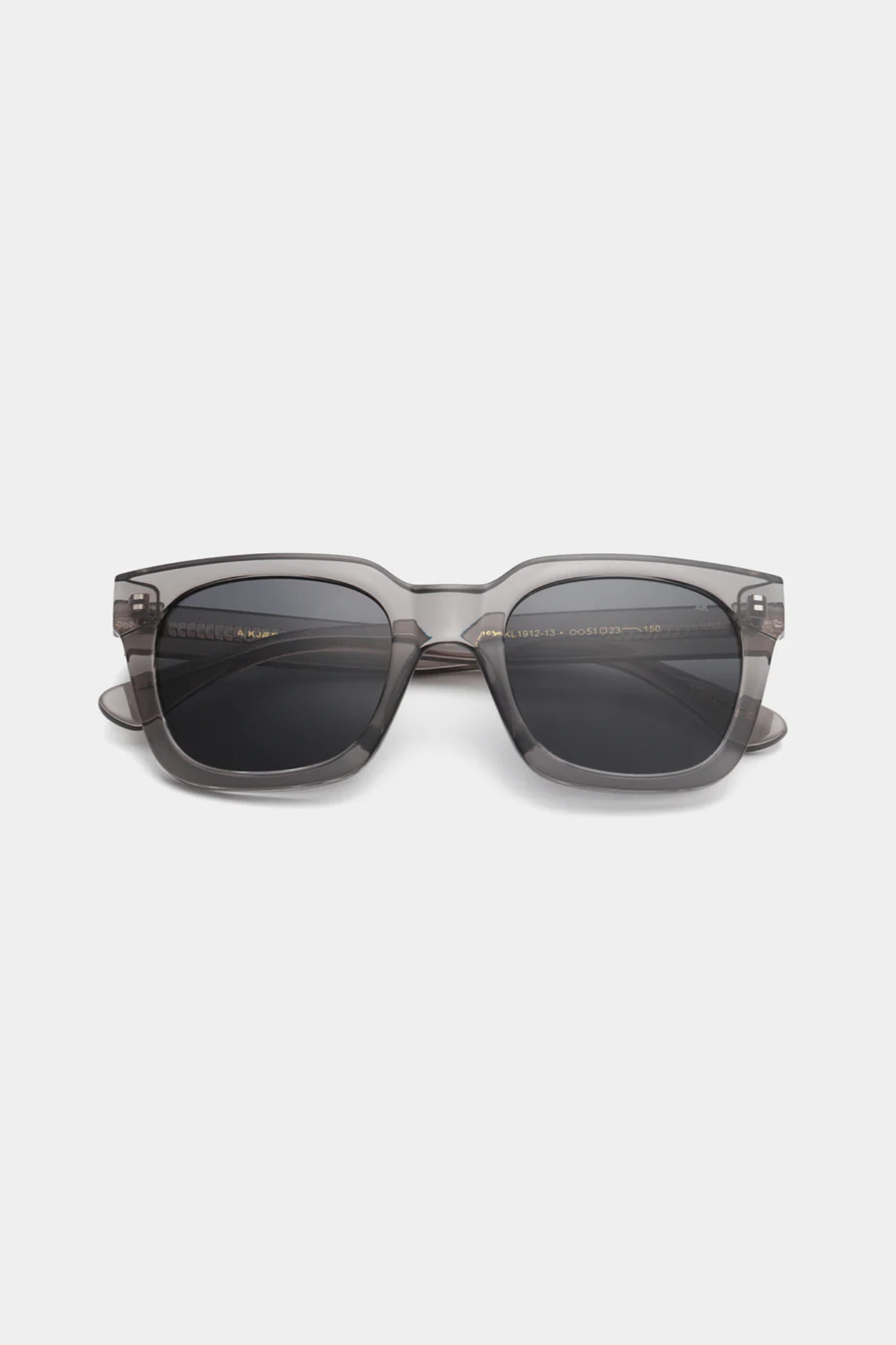 A. Kjaerbede nancy sunglasses in grey transparent. Front view