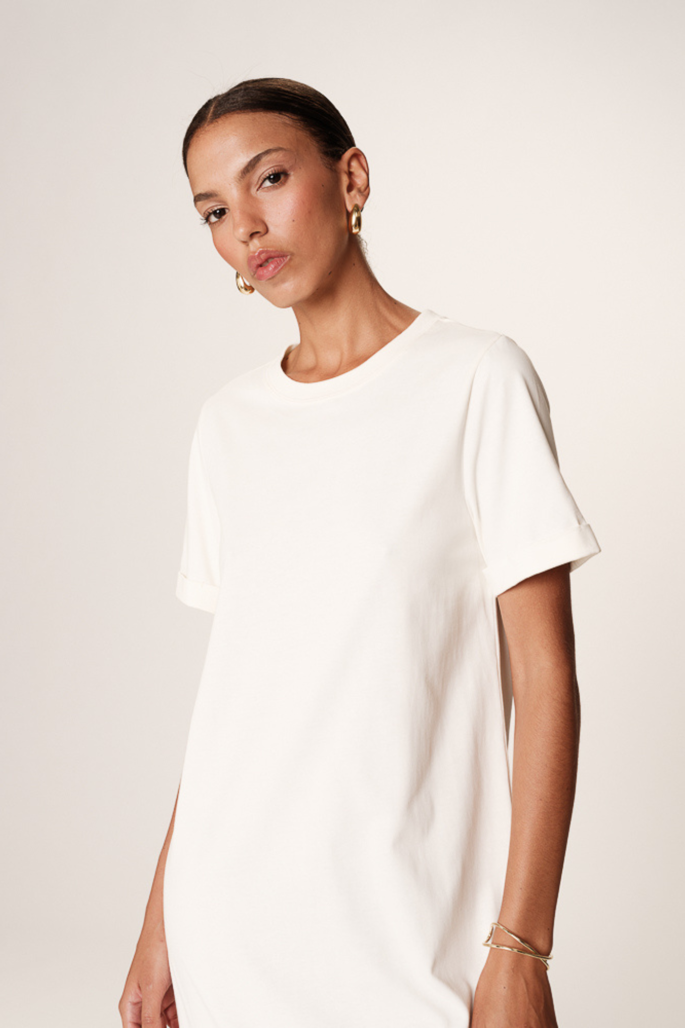 Model wearing the Grace & Mila rosalie dress in ecru. Close front view