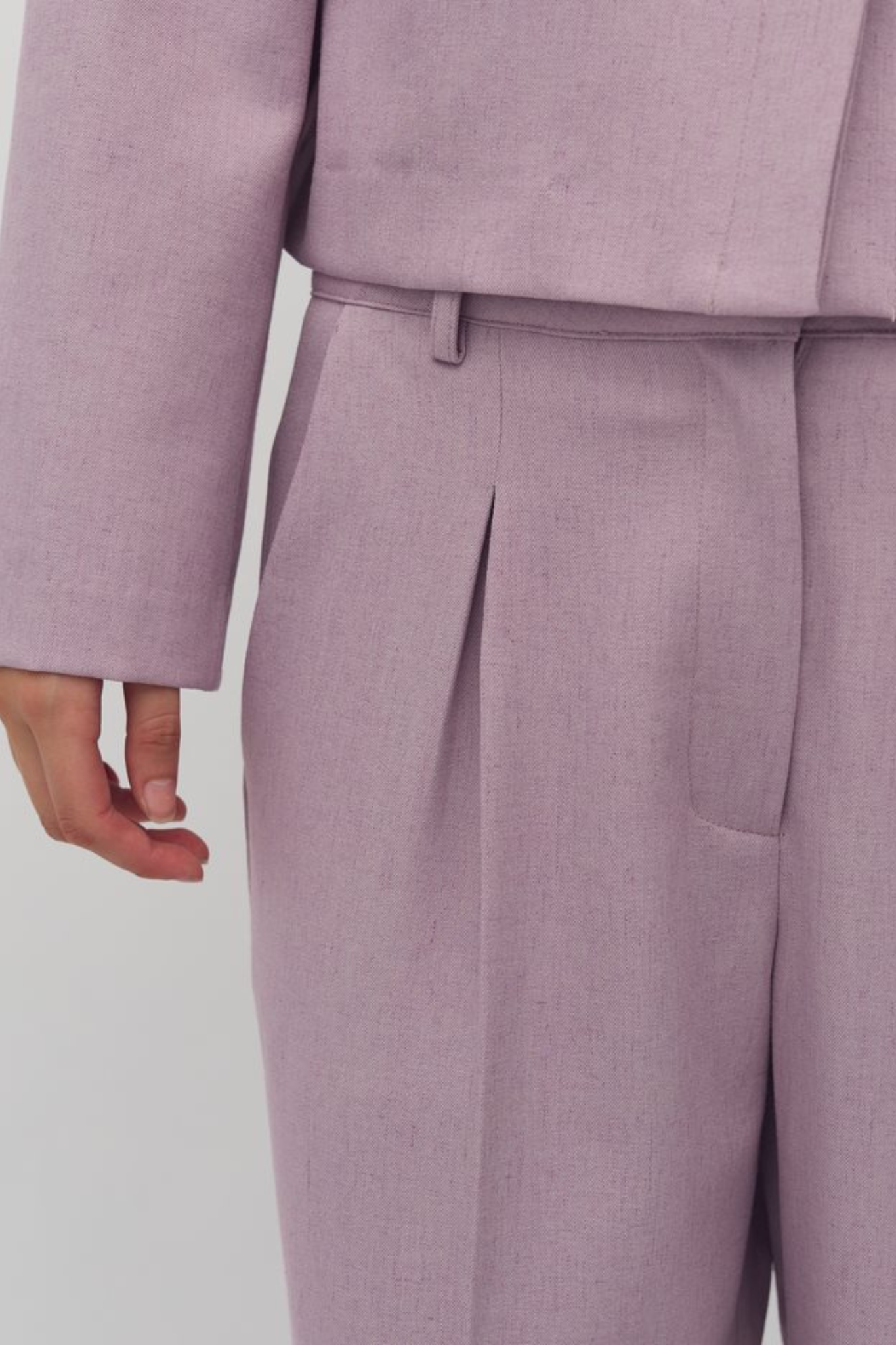 Model wearing the MBYM cristiana morenna pants in orchid bloom. Close front view