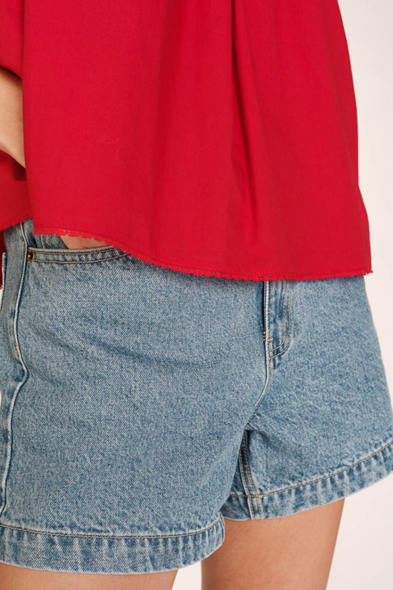 Model wearing the Grace & Mila real top in rouge. Close front view