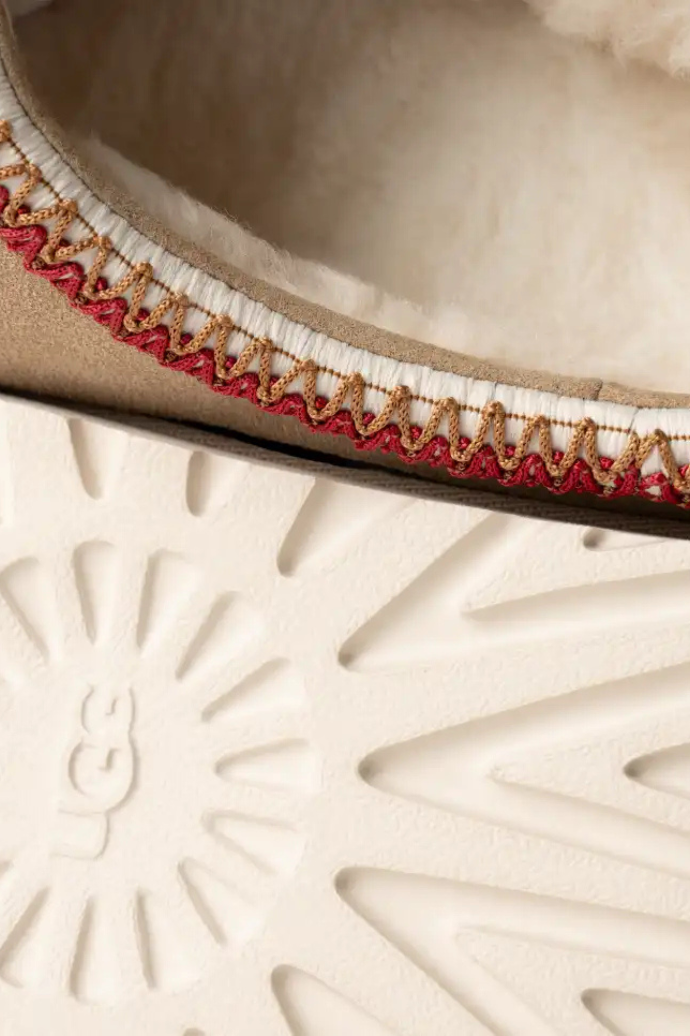 UGG women tasman in sand/dark cherry. Close front view