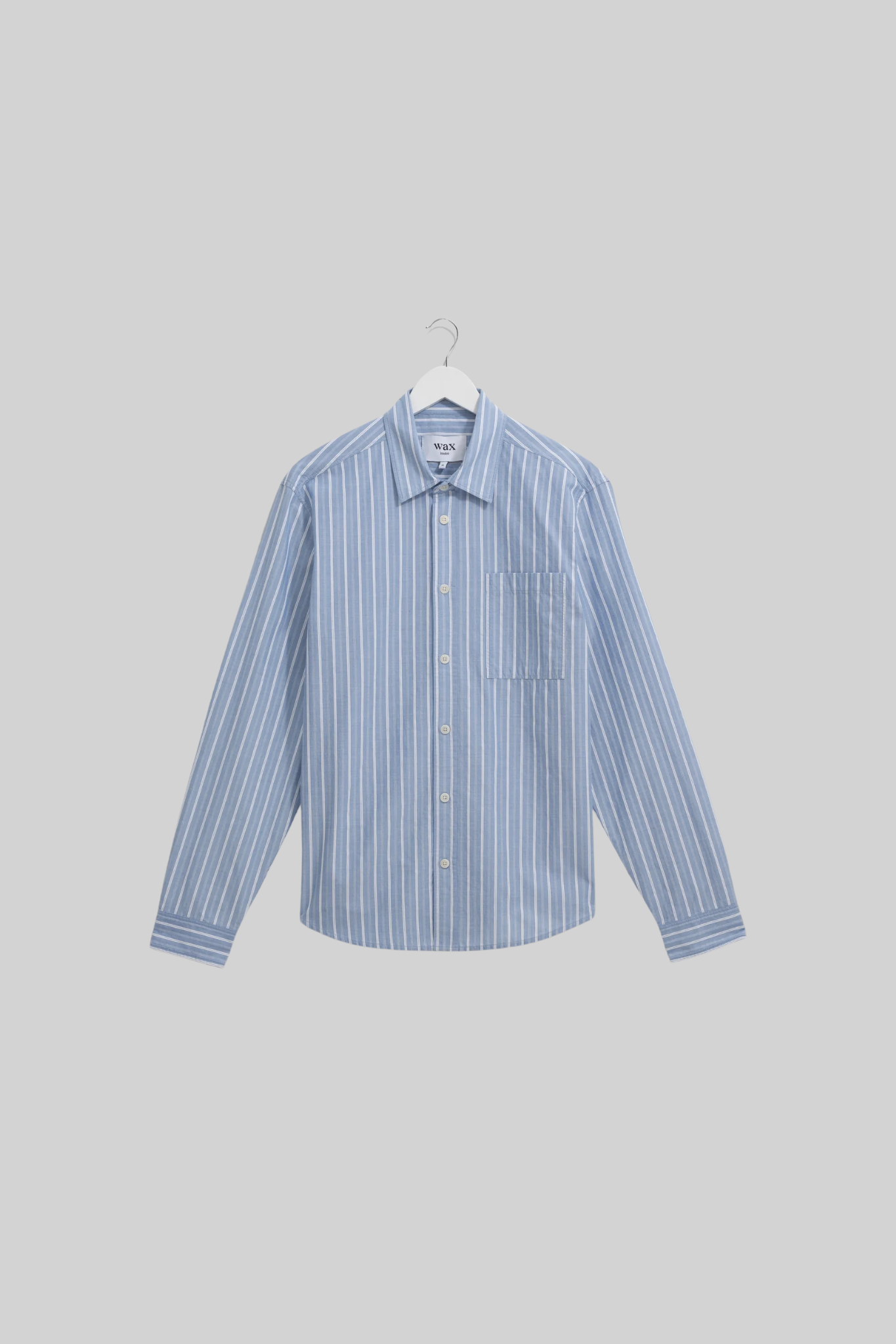 Wax London rove poplin stripe shirt in blue. Front flatlay view