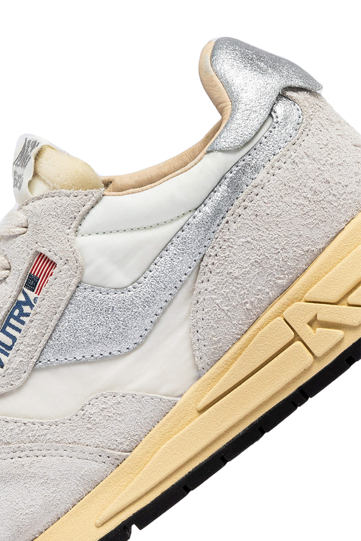 Autry reelwind low women sneakers in suede grey and white. Close side view
