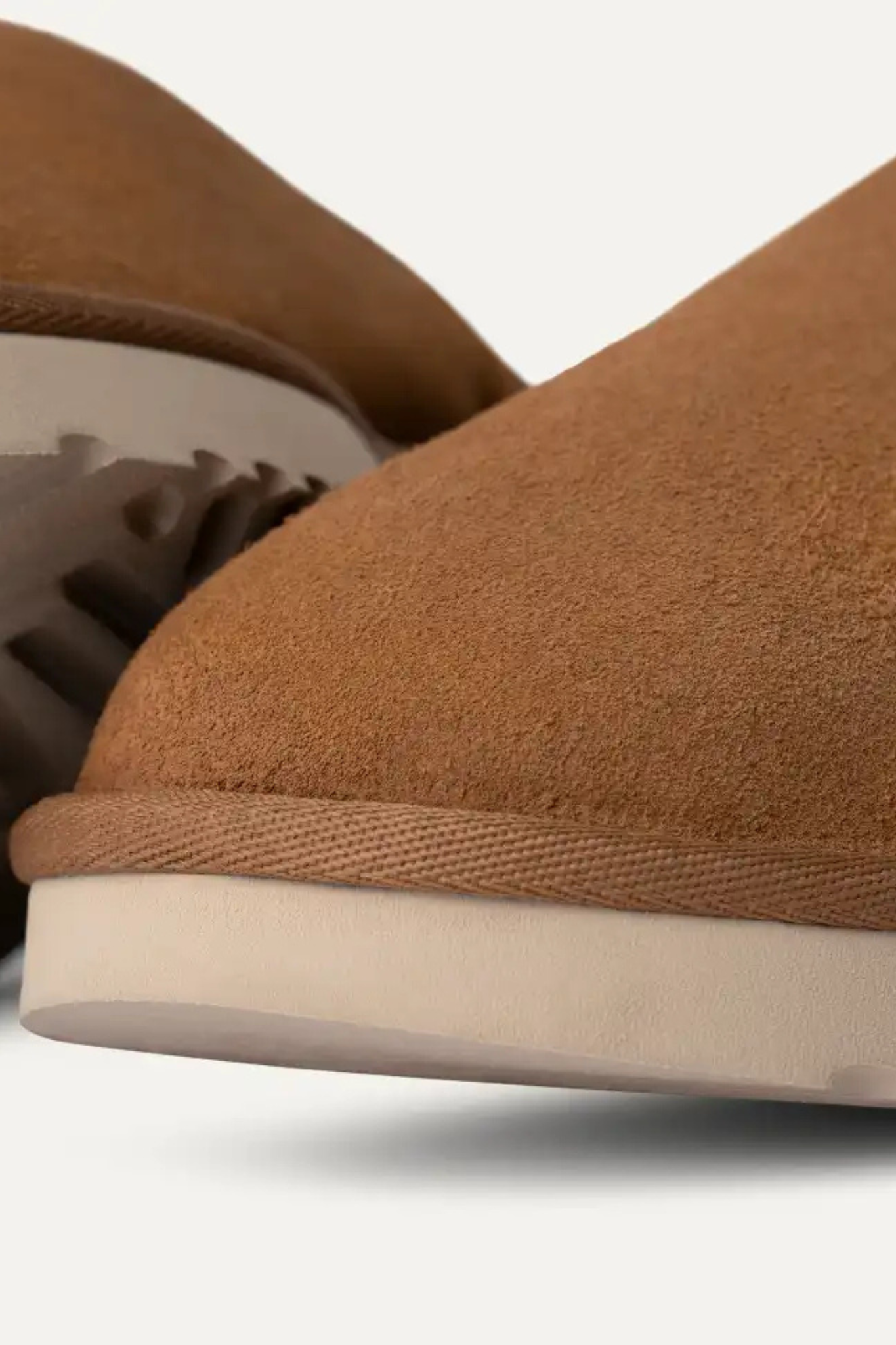 UGG man classic slip-on in chestnut. Close front view