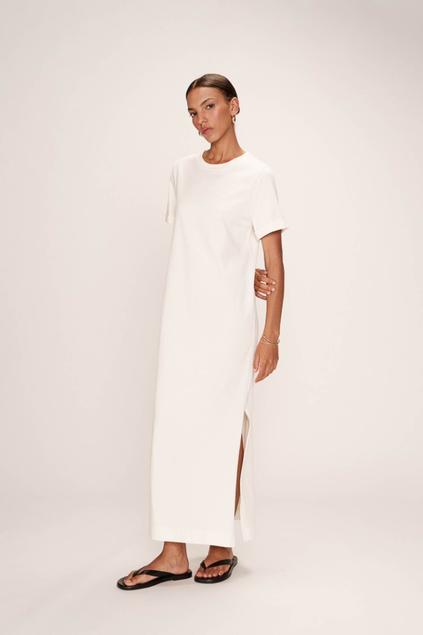 Model wearing the Grace & Mila rosalie dress in ecru. Front view