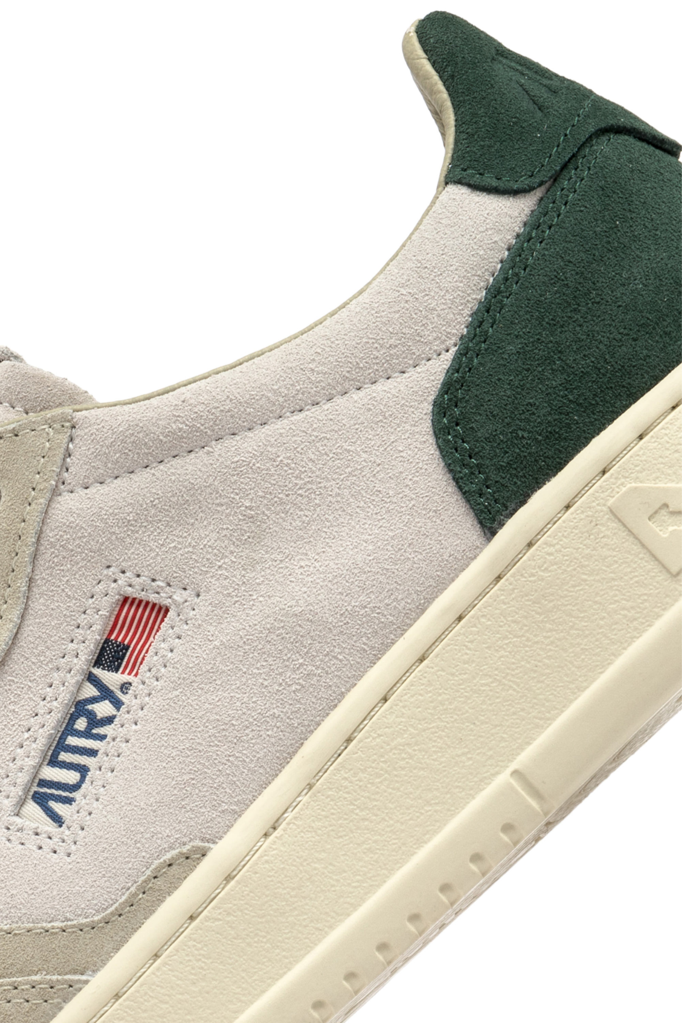 Autry medalist low man sneakers in grey and green suede. Close side view