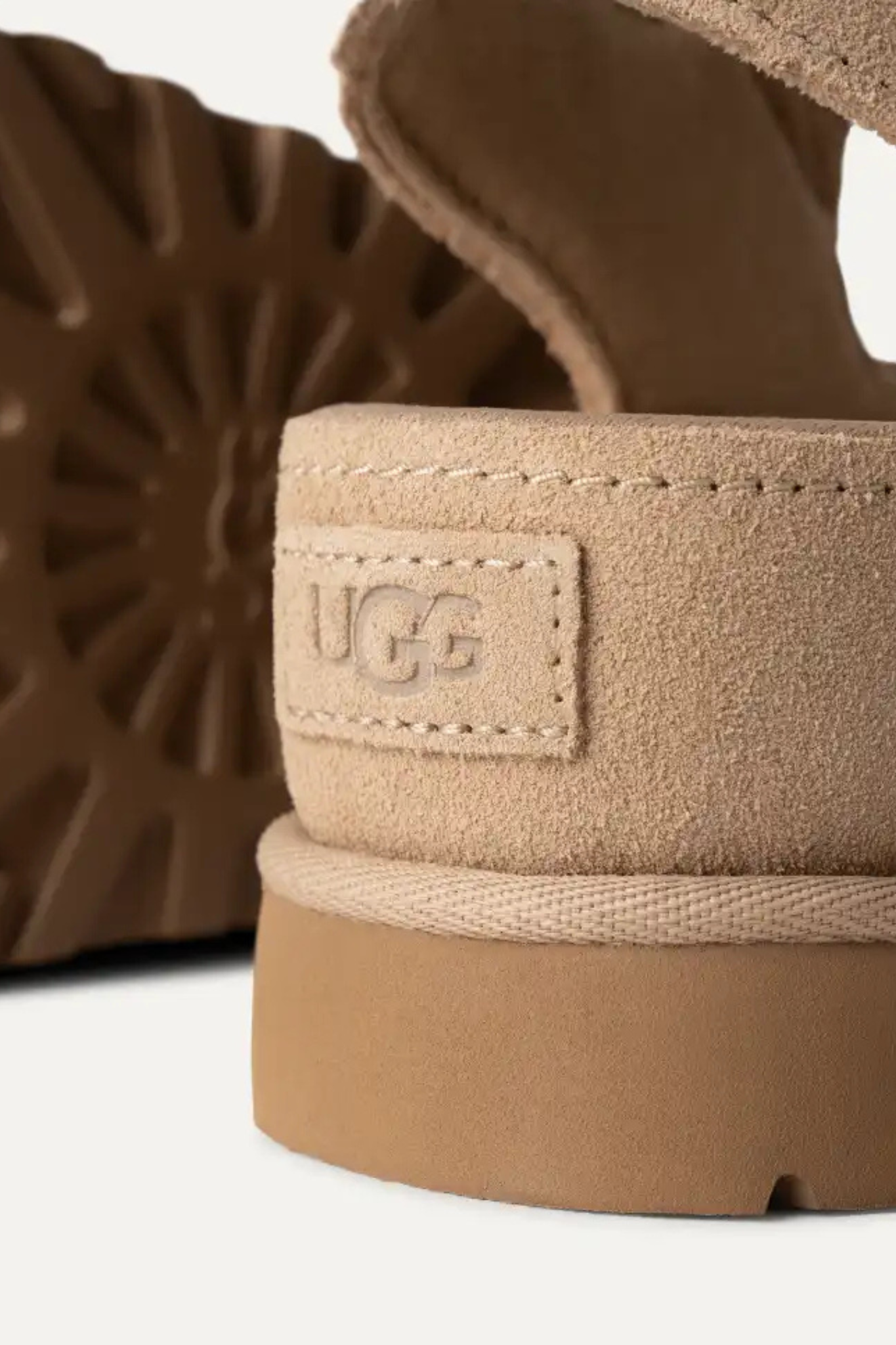 UGG women goldenstar hi in sand. Close back view