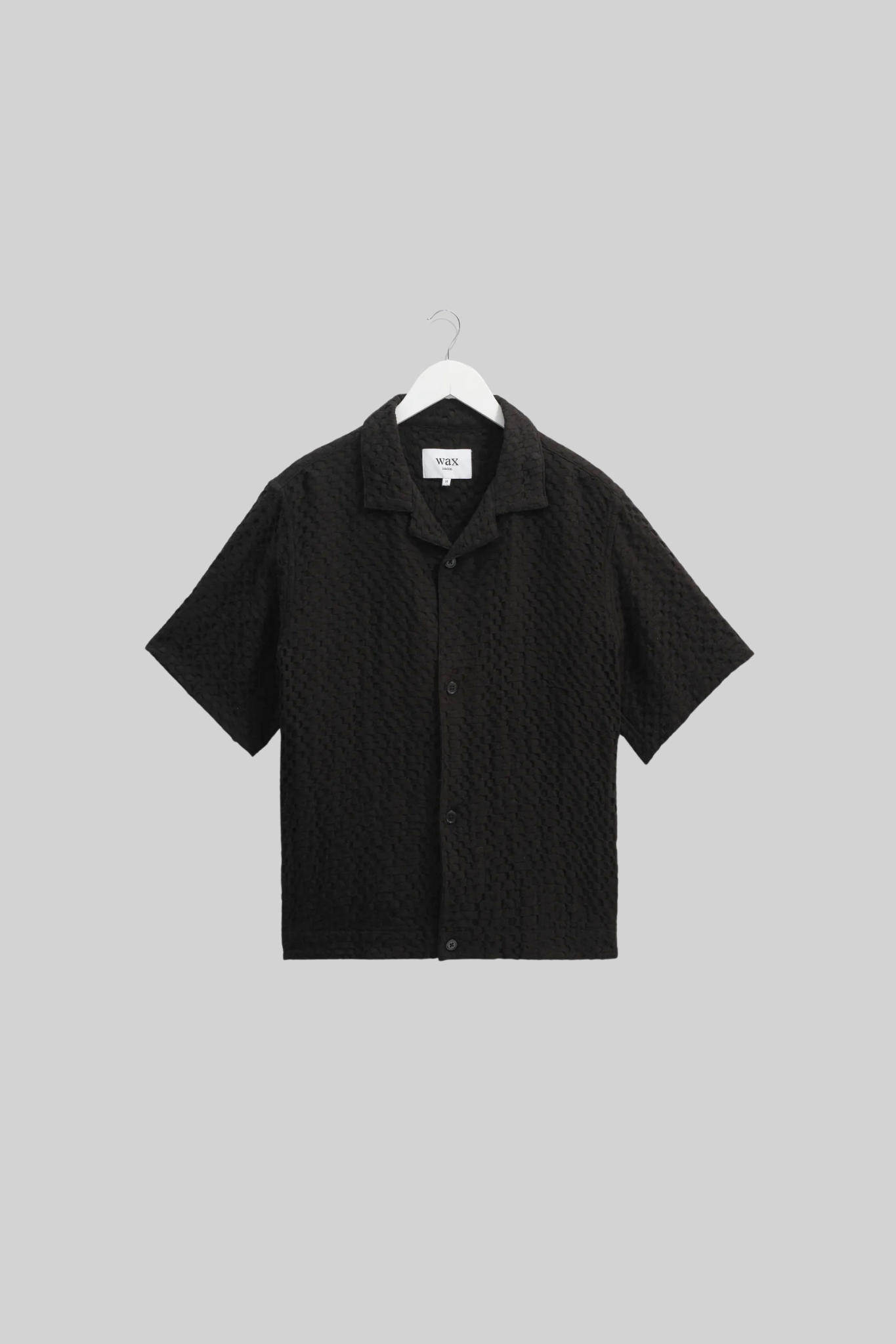 Wax London lido box dobby shirt in black. Front flatlay view