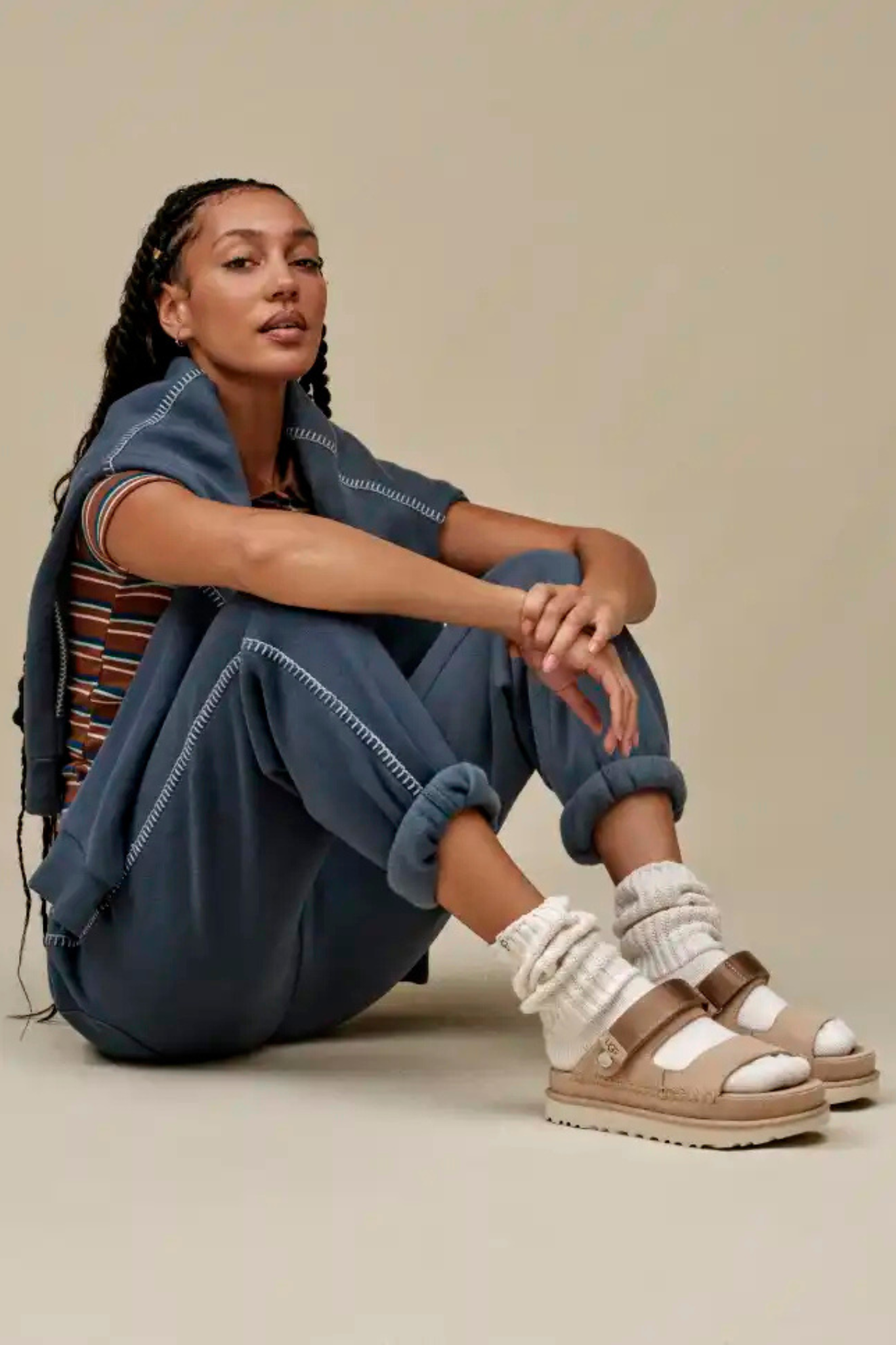 UGG women goldenstar glide in sand. Side view