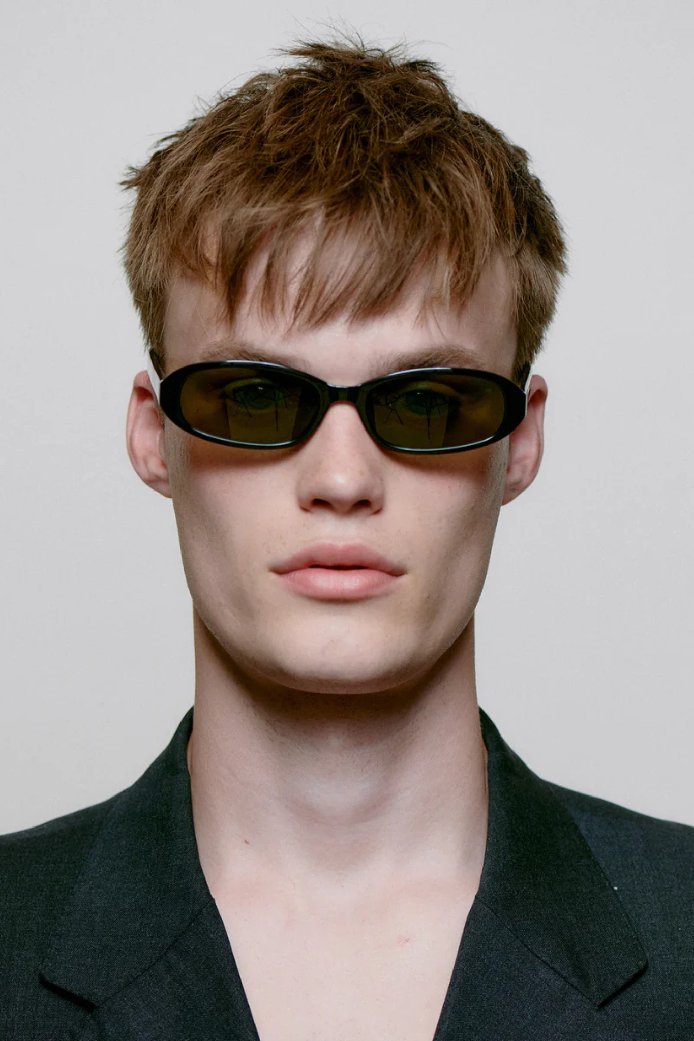 Model wearing the A. Kjaerbede macy sunglasses in black. Front view