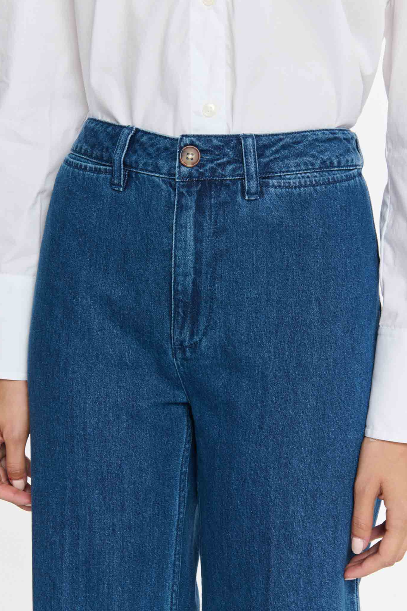 Model wearing the Labdip swann jeans in mid blue. Close front view