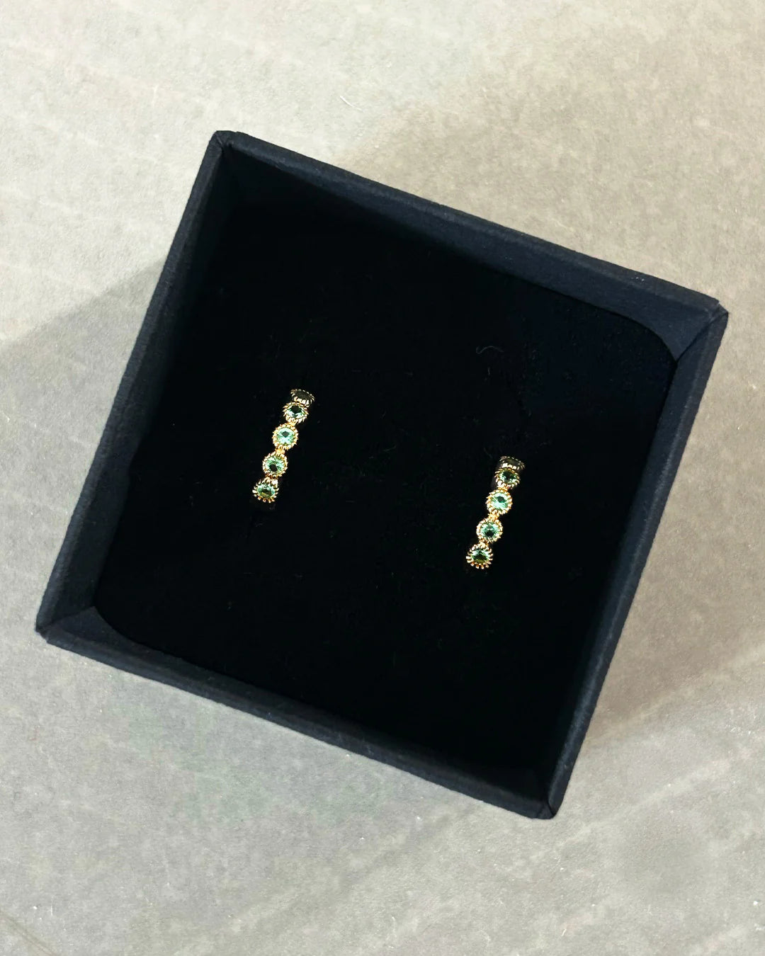 BR MULTI GREEN SWAROVSKI CLIP EARRINGS