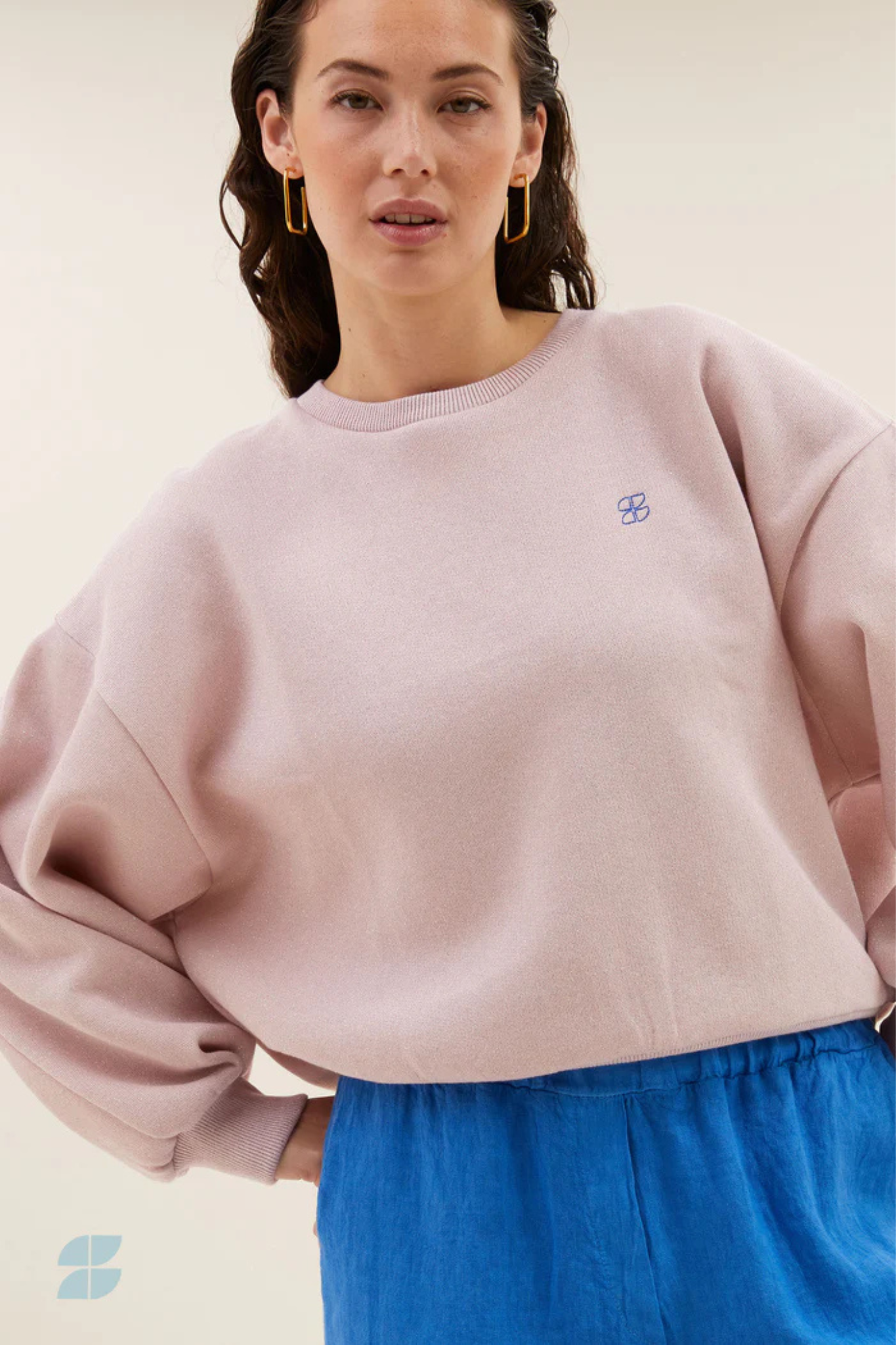 Model wearing the By-Bar bibi sparkle sweater in light pink. Front view