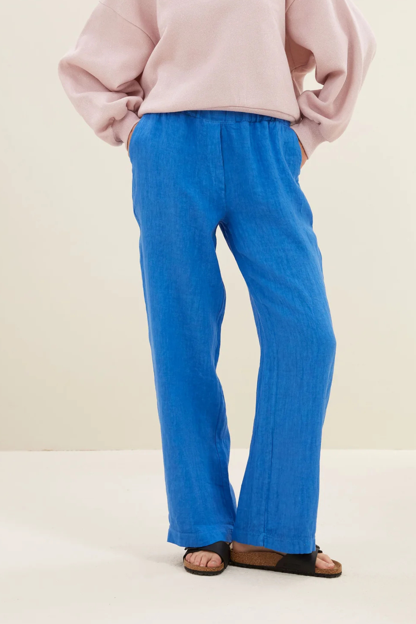 Model wearing the By-Bar robyn linen pants in queens blue. Front view