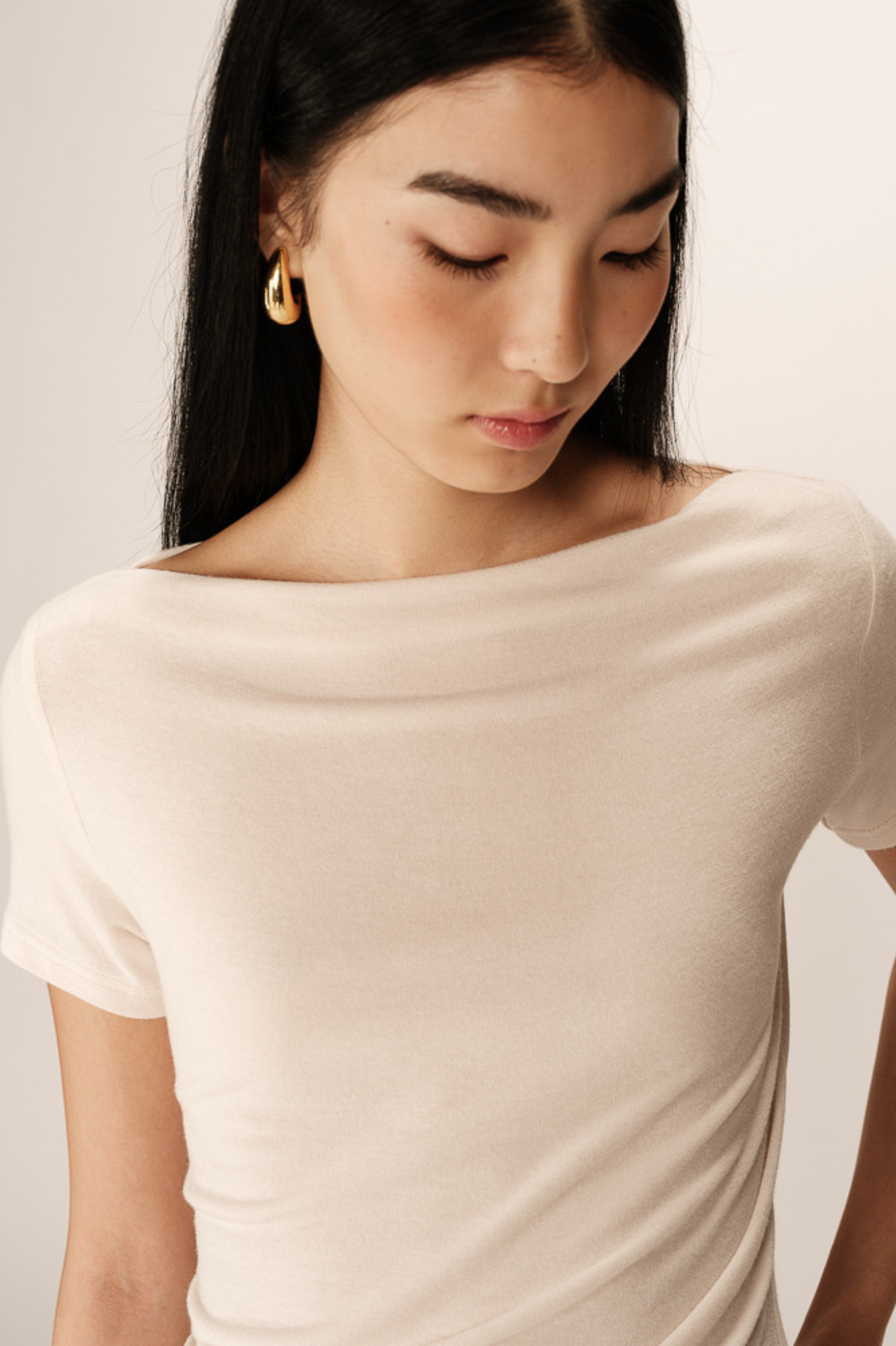 Model wearing the Grace & Mila pilar top in beige. Front view