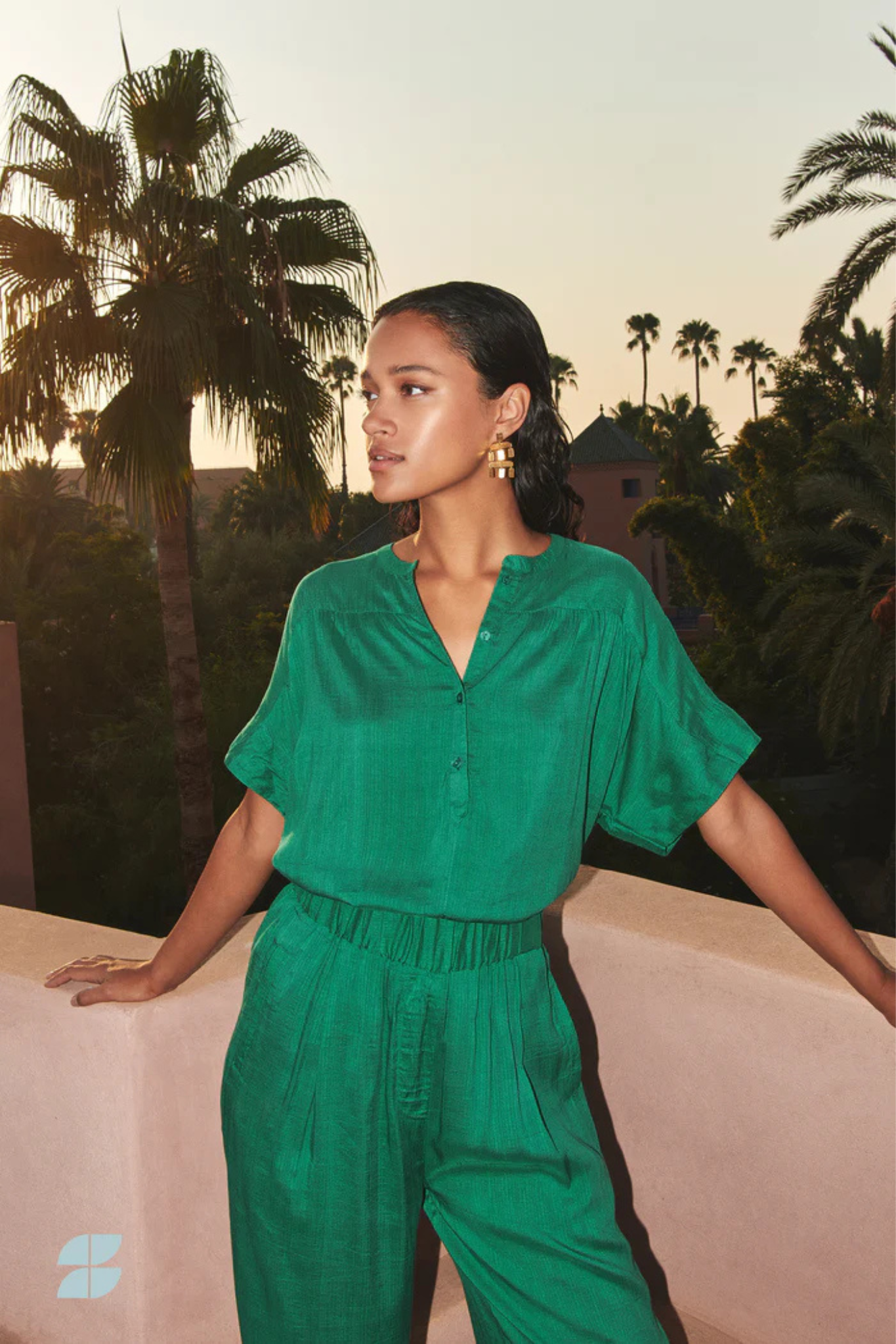 Model wearing the By-Bar bo dobby blouse in bright green. Front view