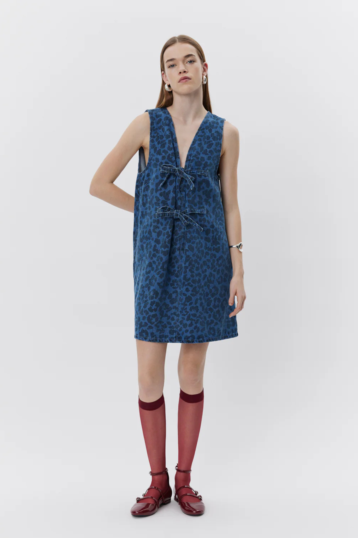 Model wearing the Sofie Schnoor ingrid dress in leopard denim blue. Front view